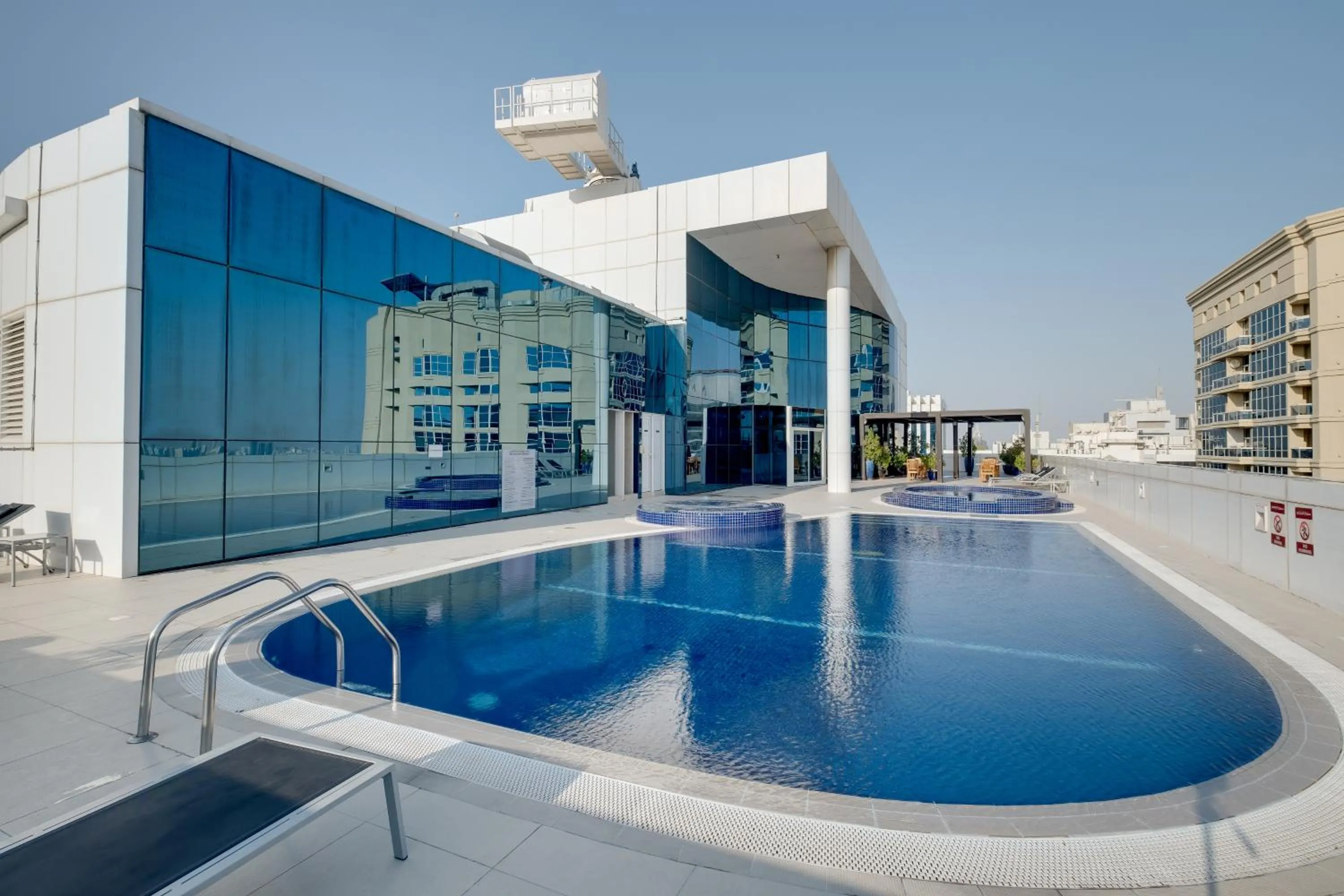 Property building in Luxury Apt - Rooftop Pool - City View