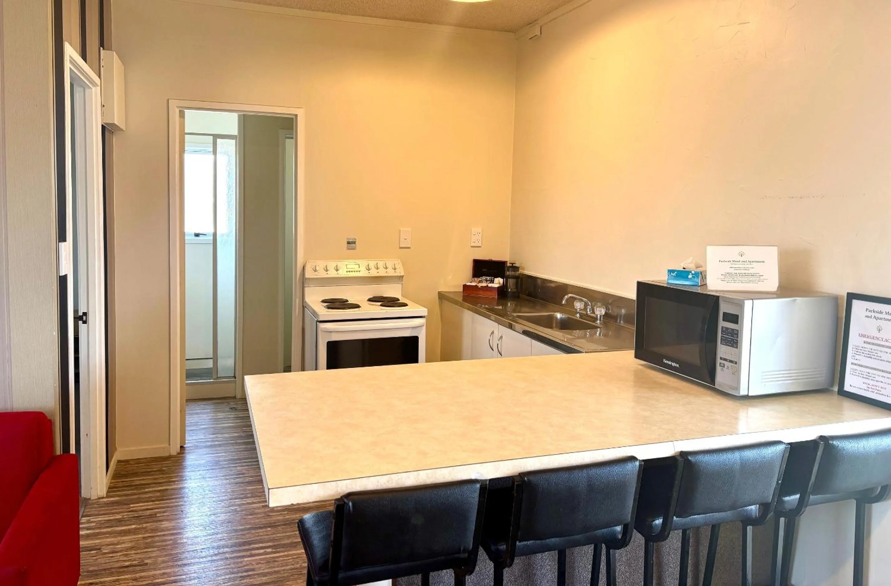 Kitchen or kitchenette in Parkside Motel and Apartments