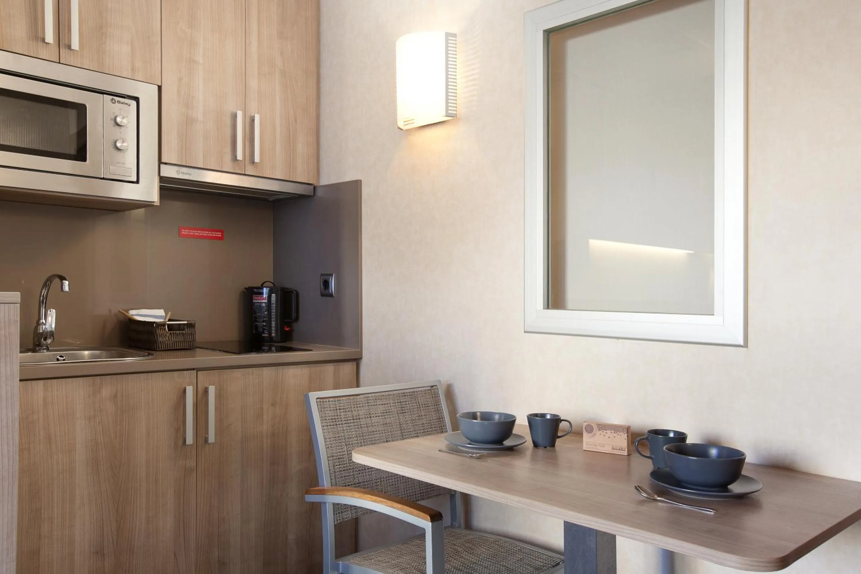 Kitchen or kitchenette in Aparthotel Silver