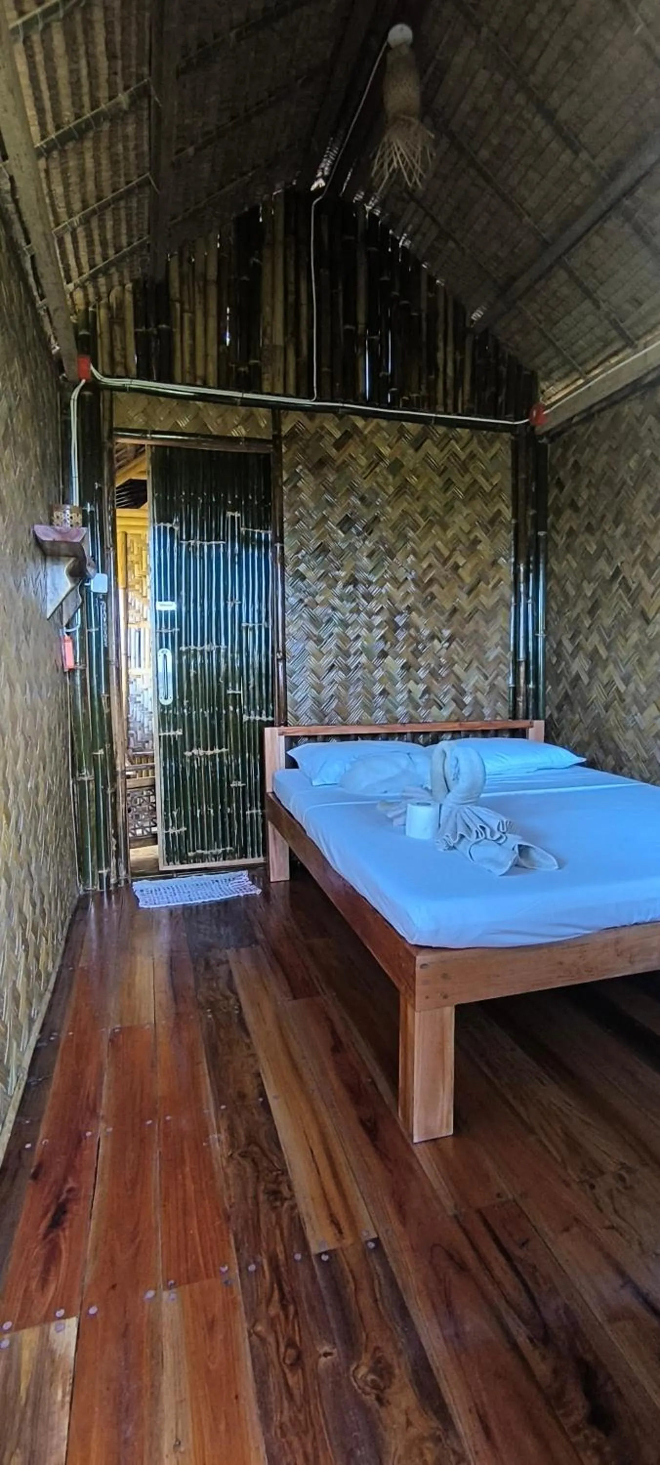 Bed in Ocean Green Eco Lodge