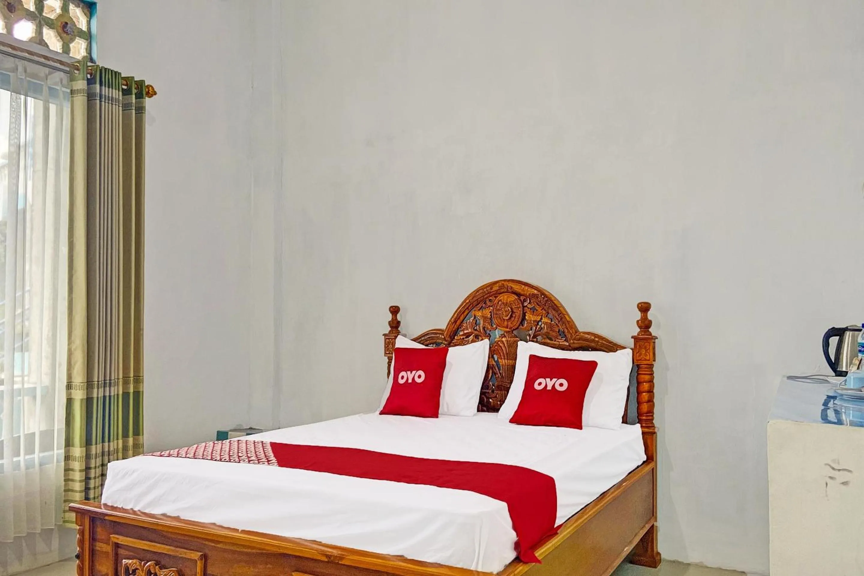Bedroom in OYO 91927 Homestay Kebun