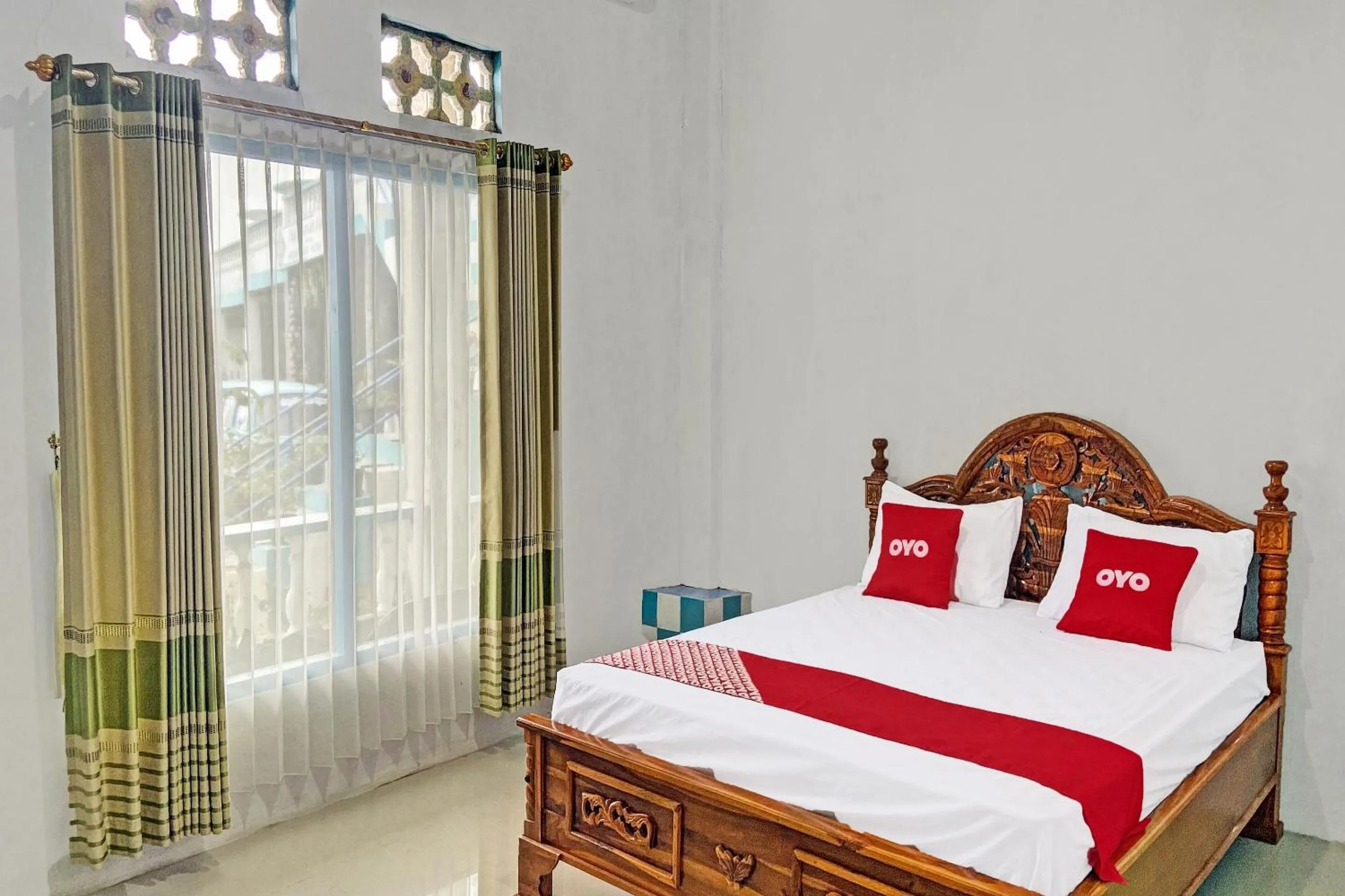 Bedroom in OYO 91927 Homestay Kebun