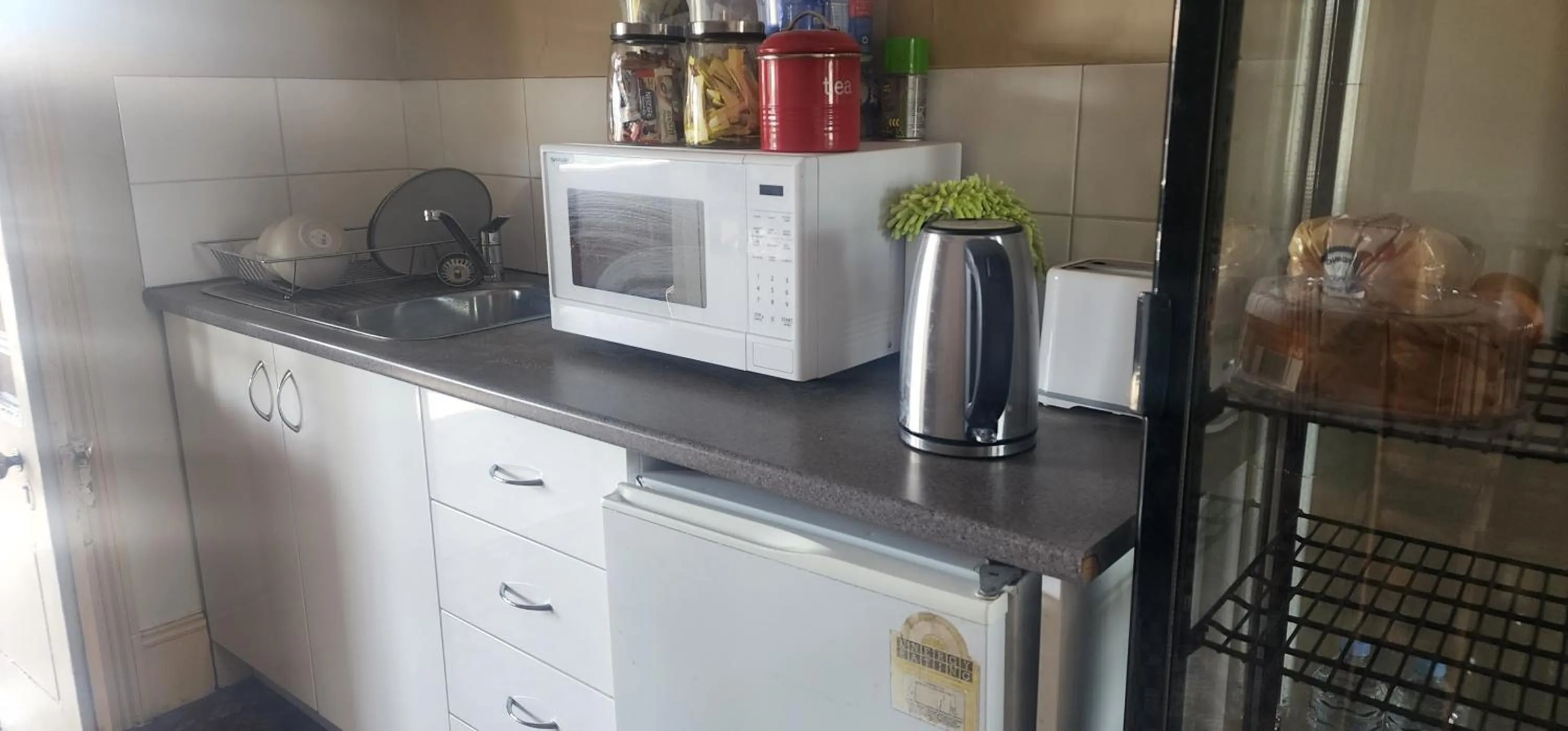 Kitchen or kitchenette in Family Hotel