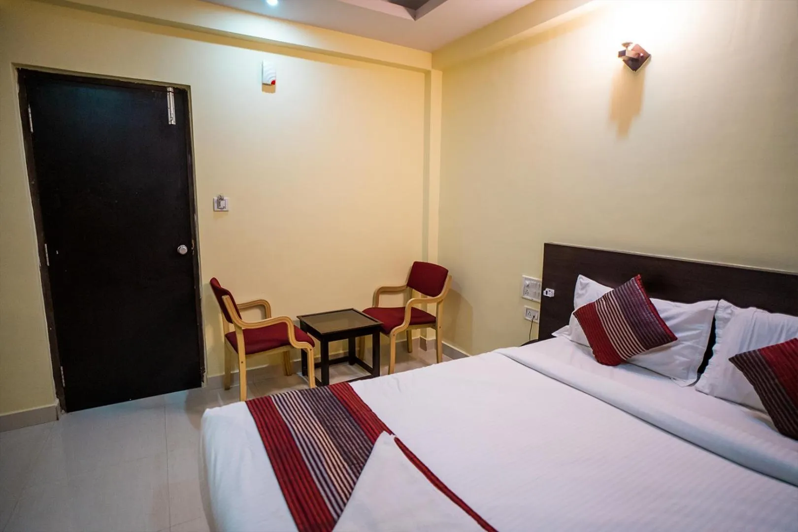 Bedroom, Bed in HOTEL PRAKAASH COMFORTS