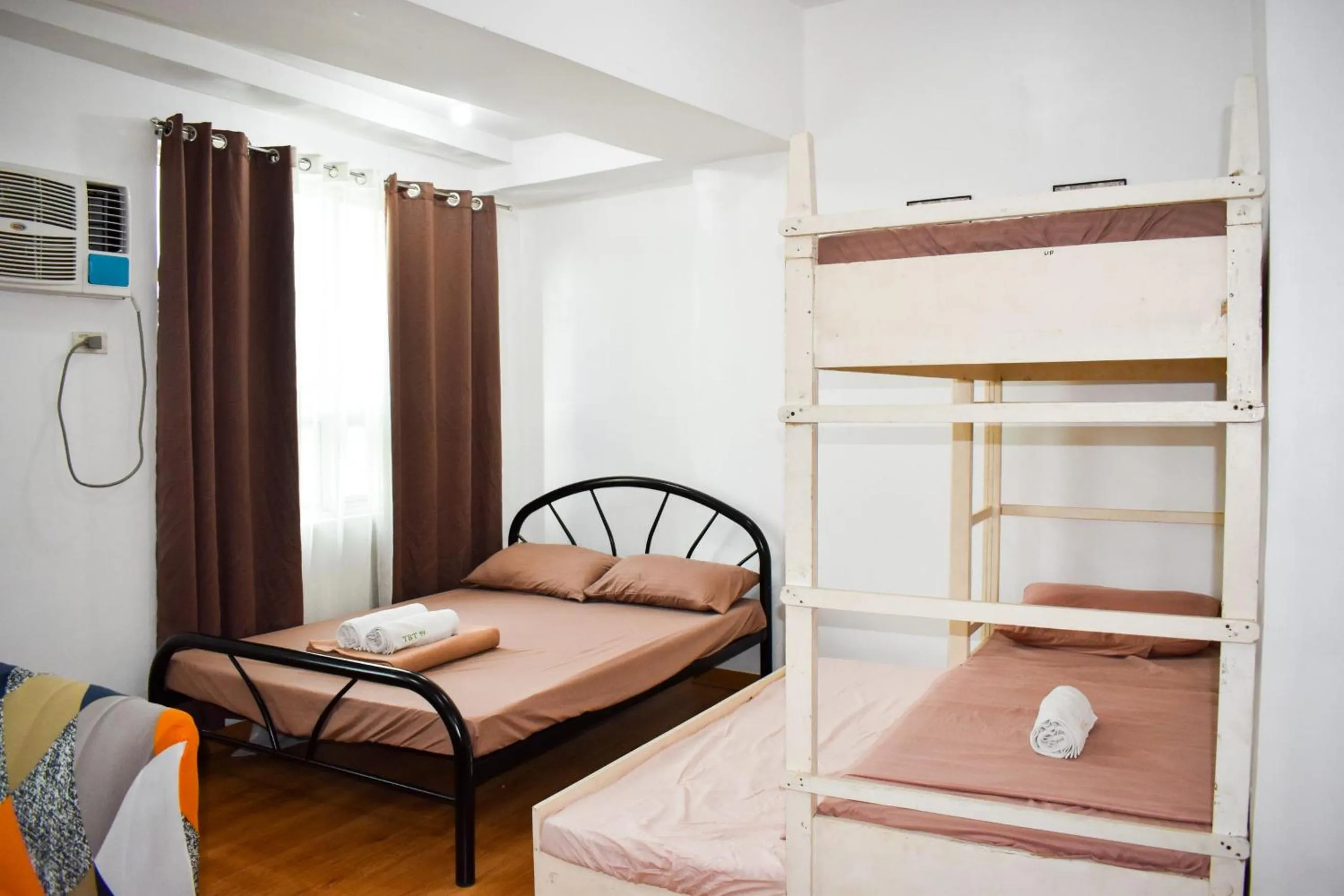 Bedroom, Bed in The Boni Tower by RSPL Manila City Center