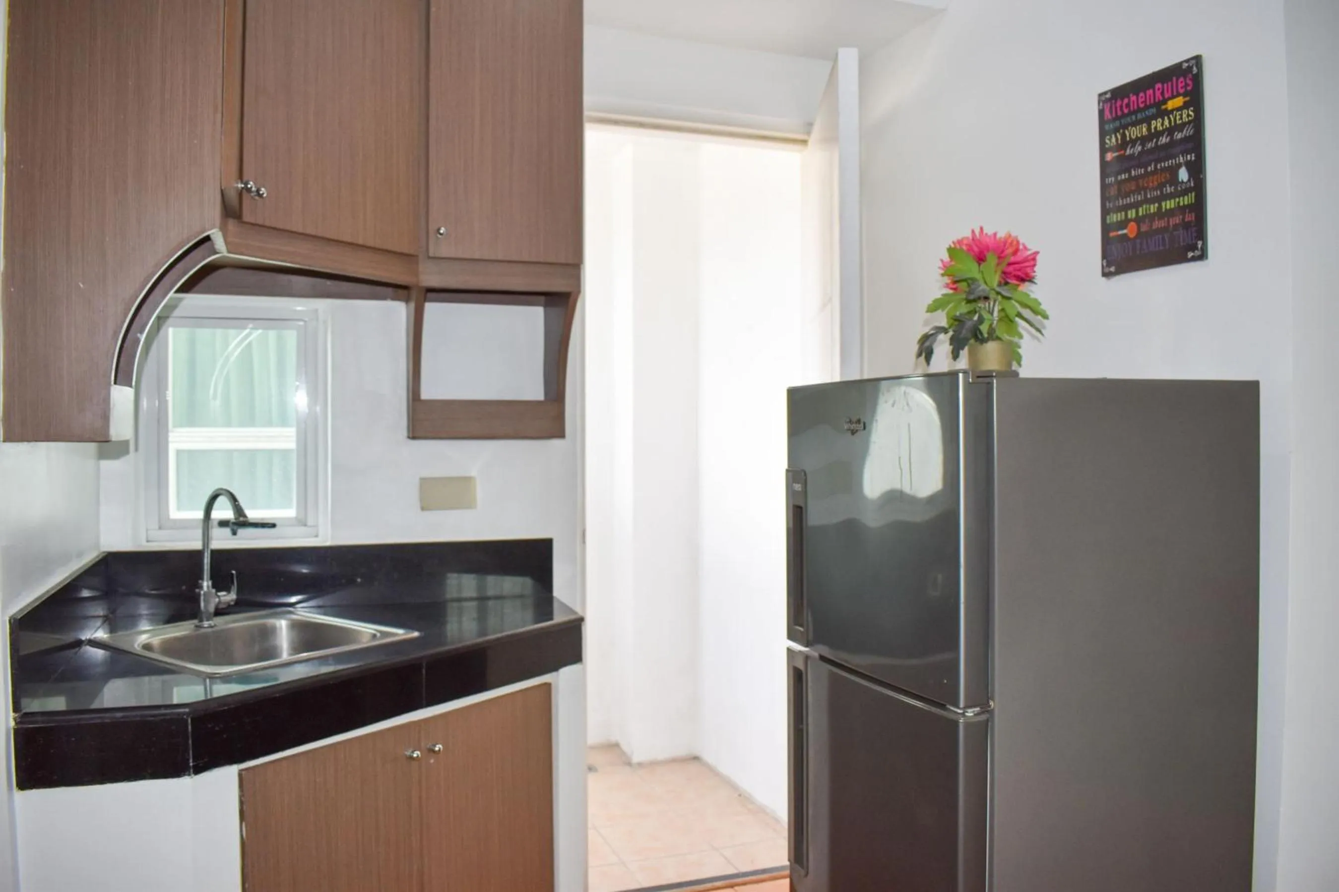 Kitchen or kitchenette in The Boni Tower by RSPL Manila City Center