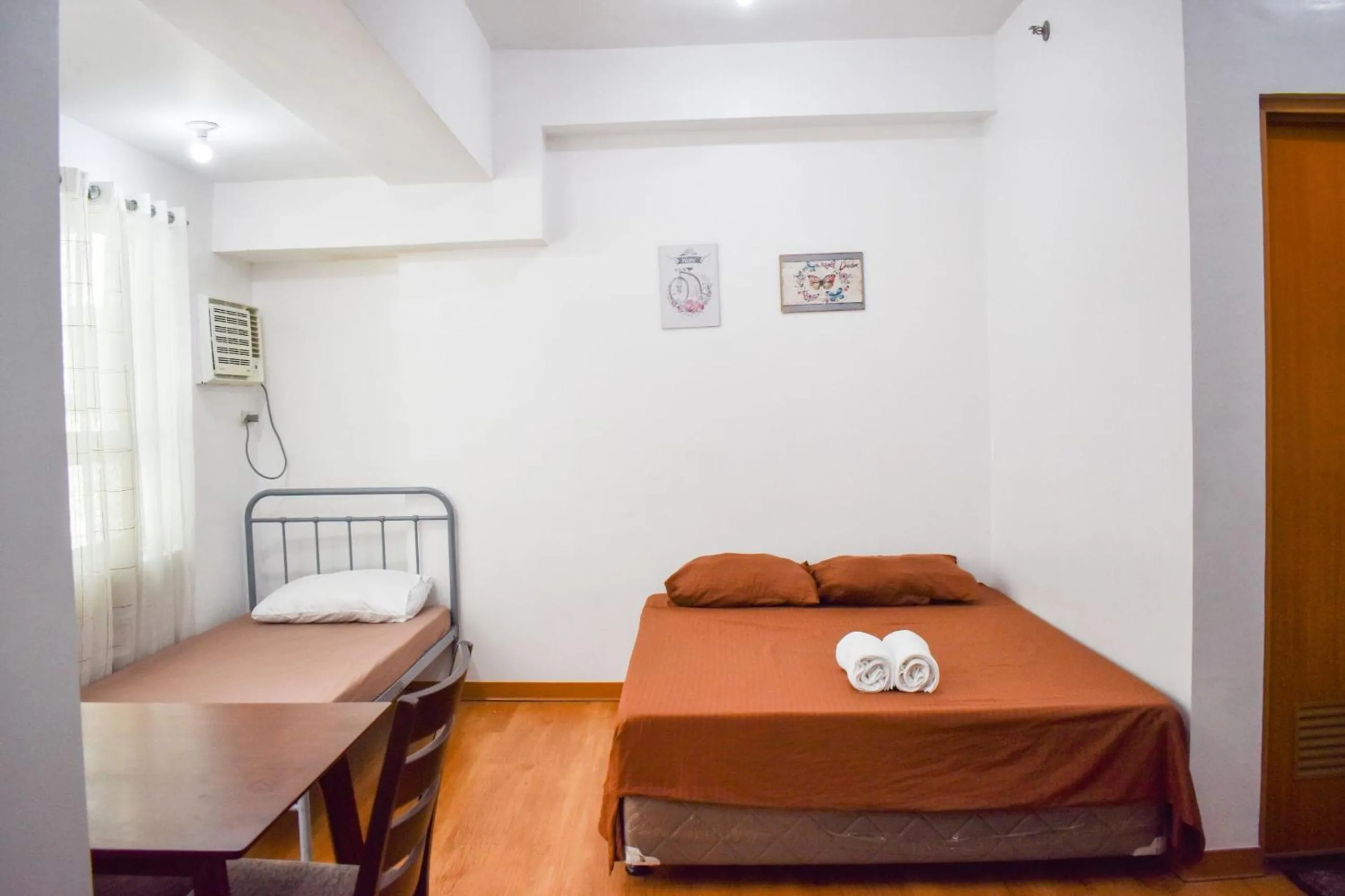 Bed in The Boni Tower by RSPL Manila City Center