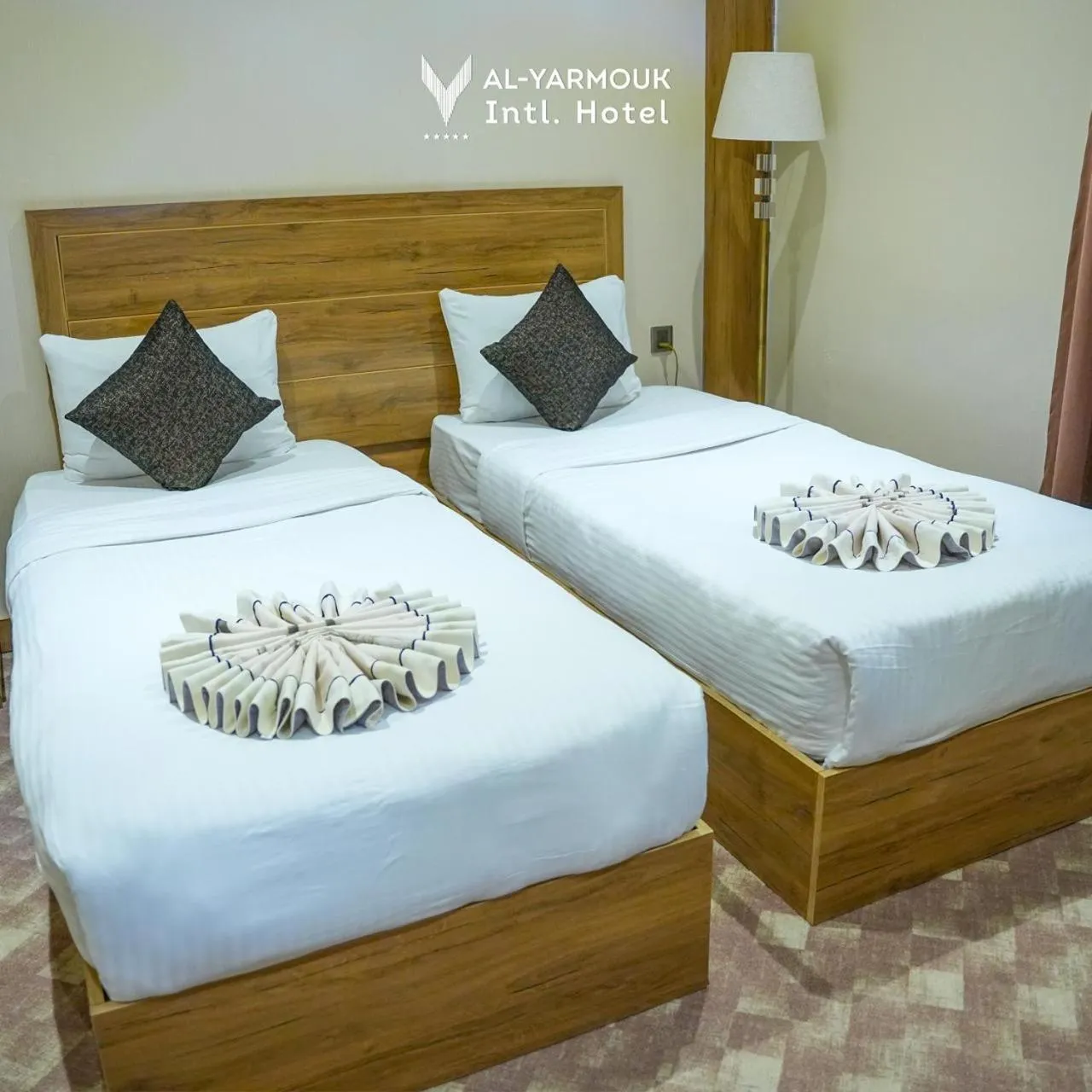Bed in Al Yarmouk International Hotel