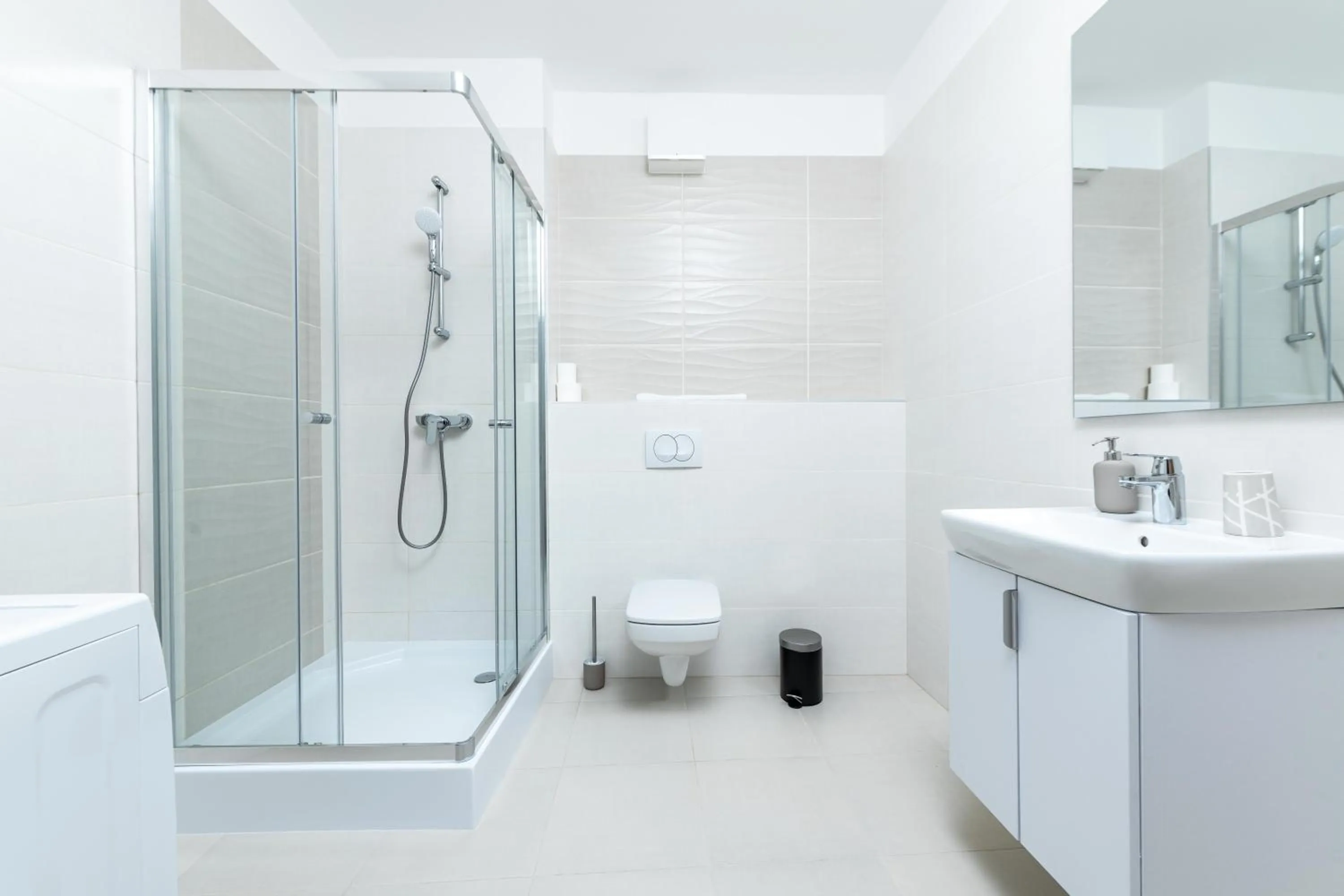 Shower in WestSide Apartments by FirstHost