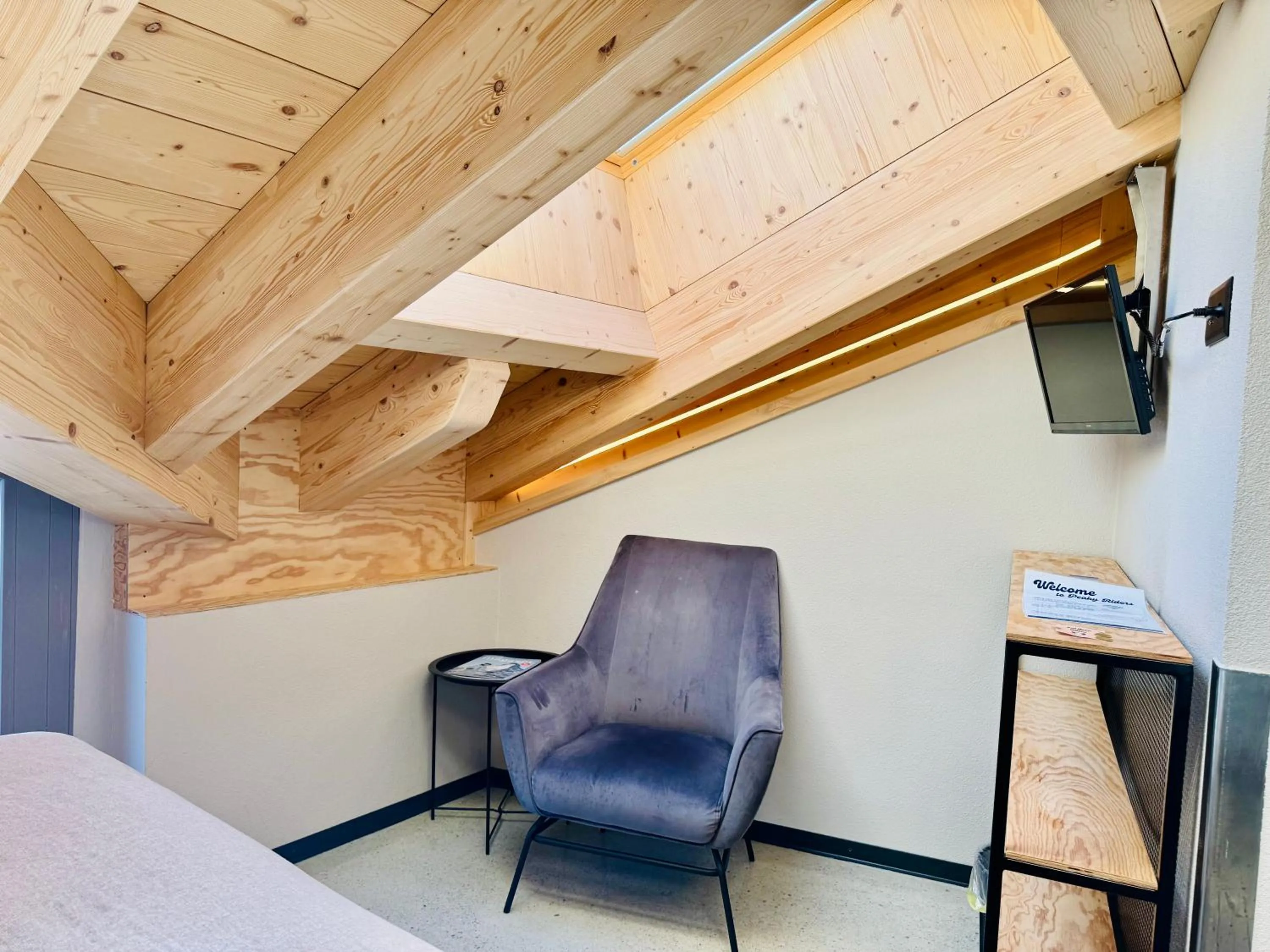 Seating area in Peaky Riders Self Check-in Hotel