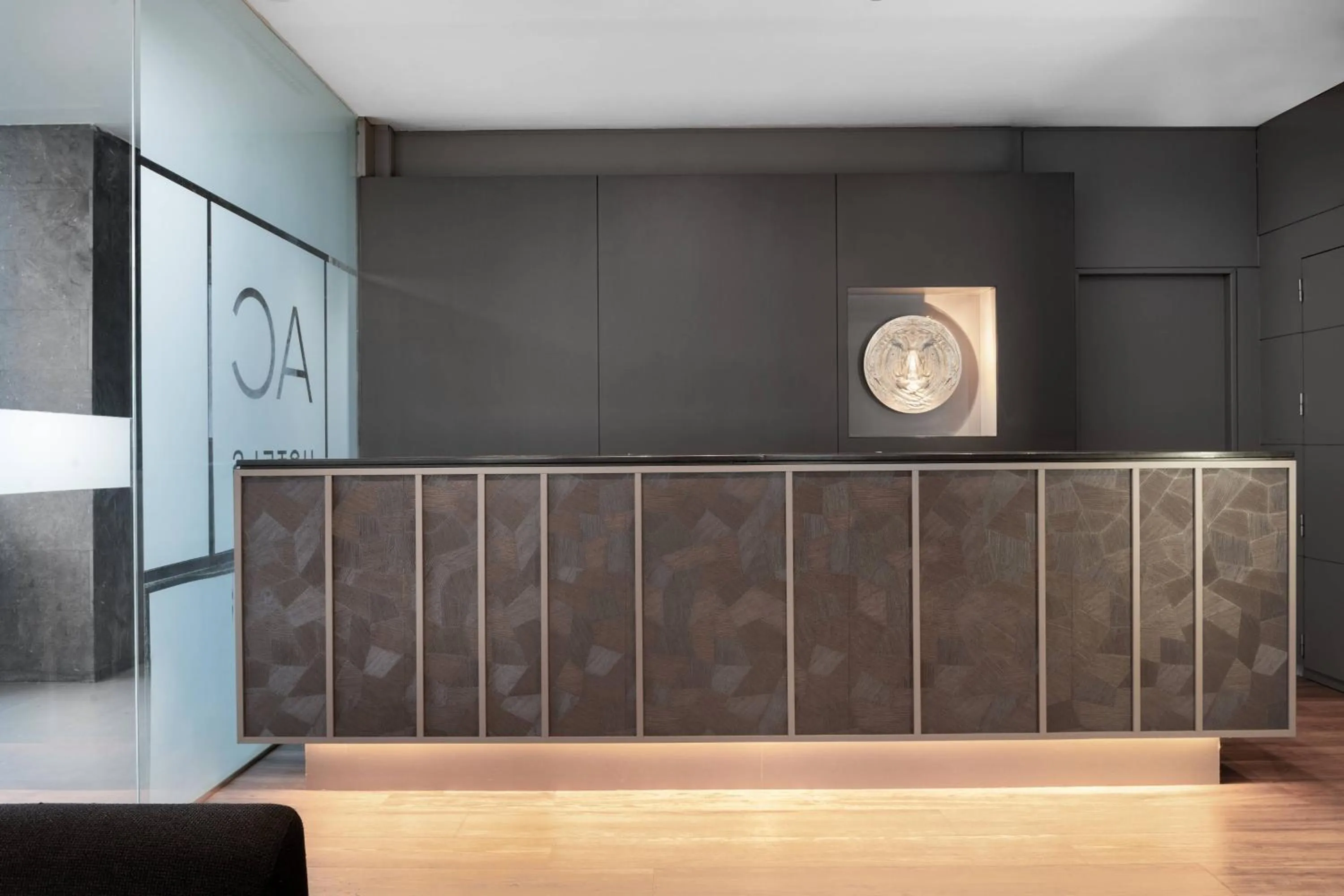 Lobby or reception in AC Hotel Huelva by Marriott