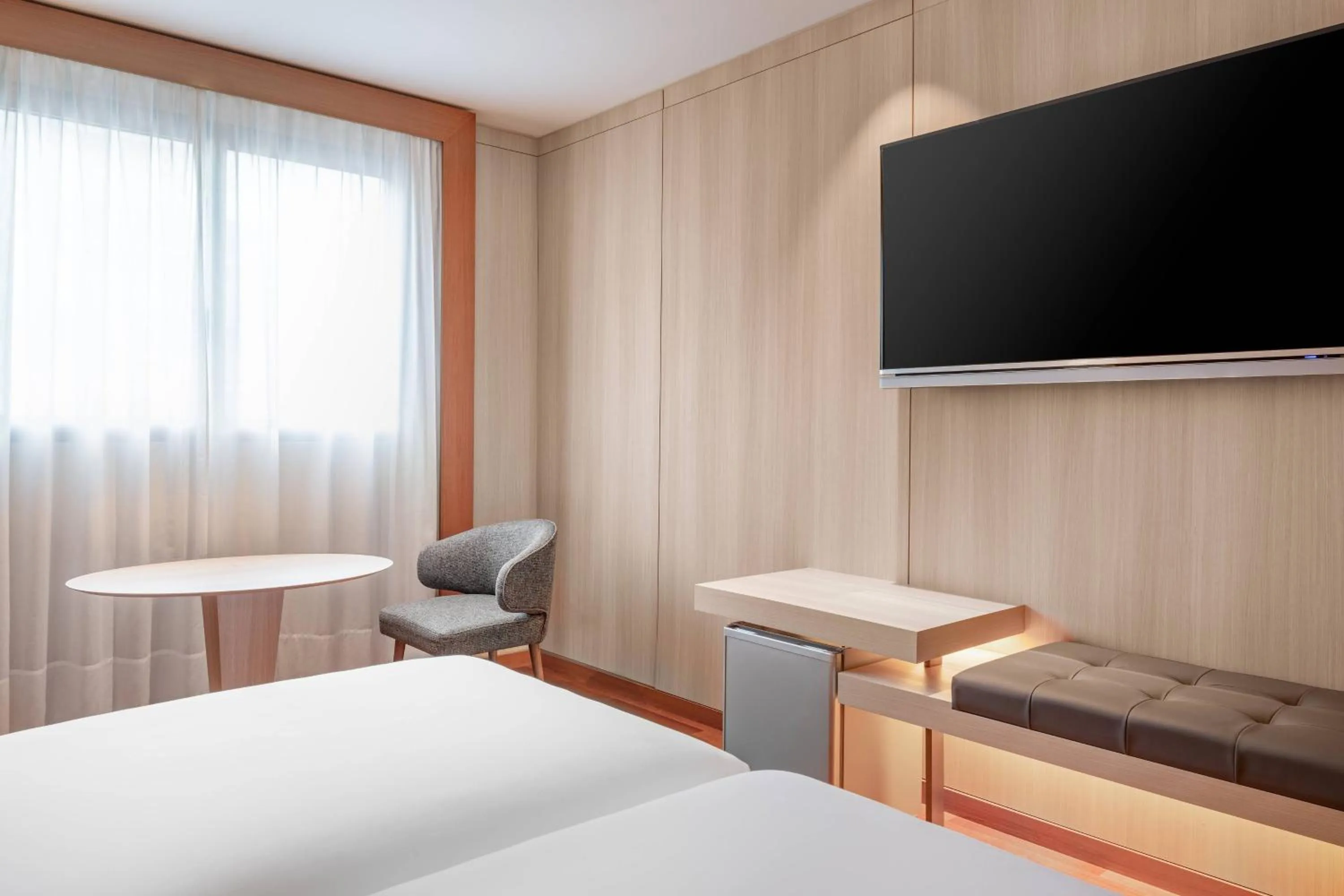 Photo of the whole room, Bed in AC Hotel Huelva by Marriott