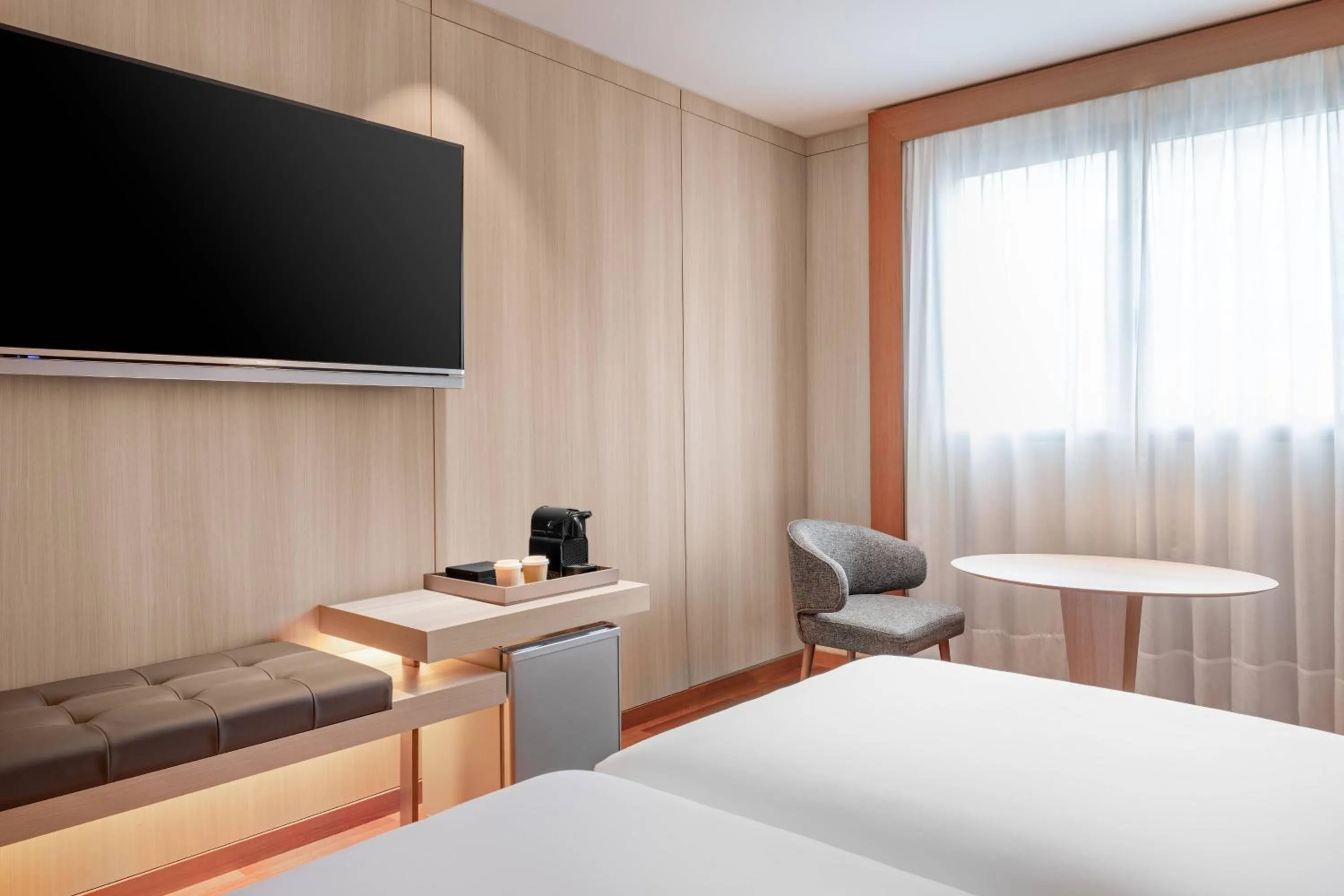 Photo of the whole room, Bed in AC Hotel Huelva by Marriott