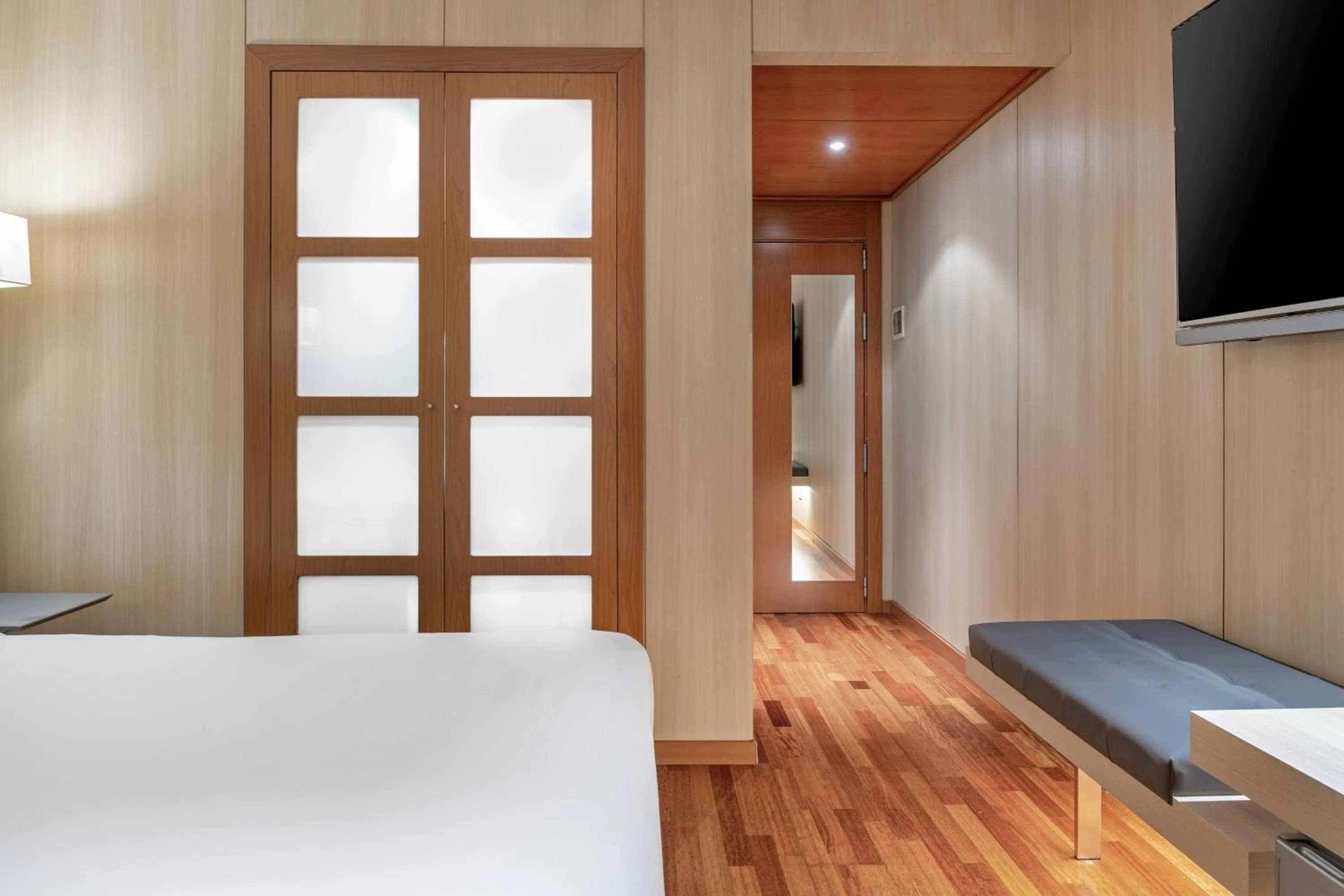 Photo of the whole room, Bed in AC Hotel Huelva by Marriott