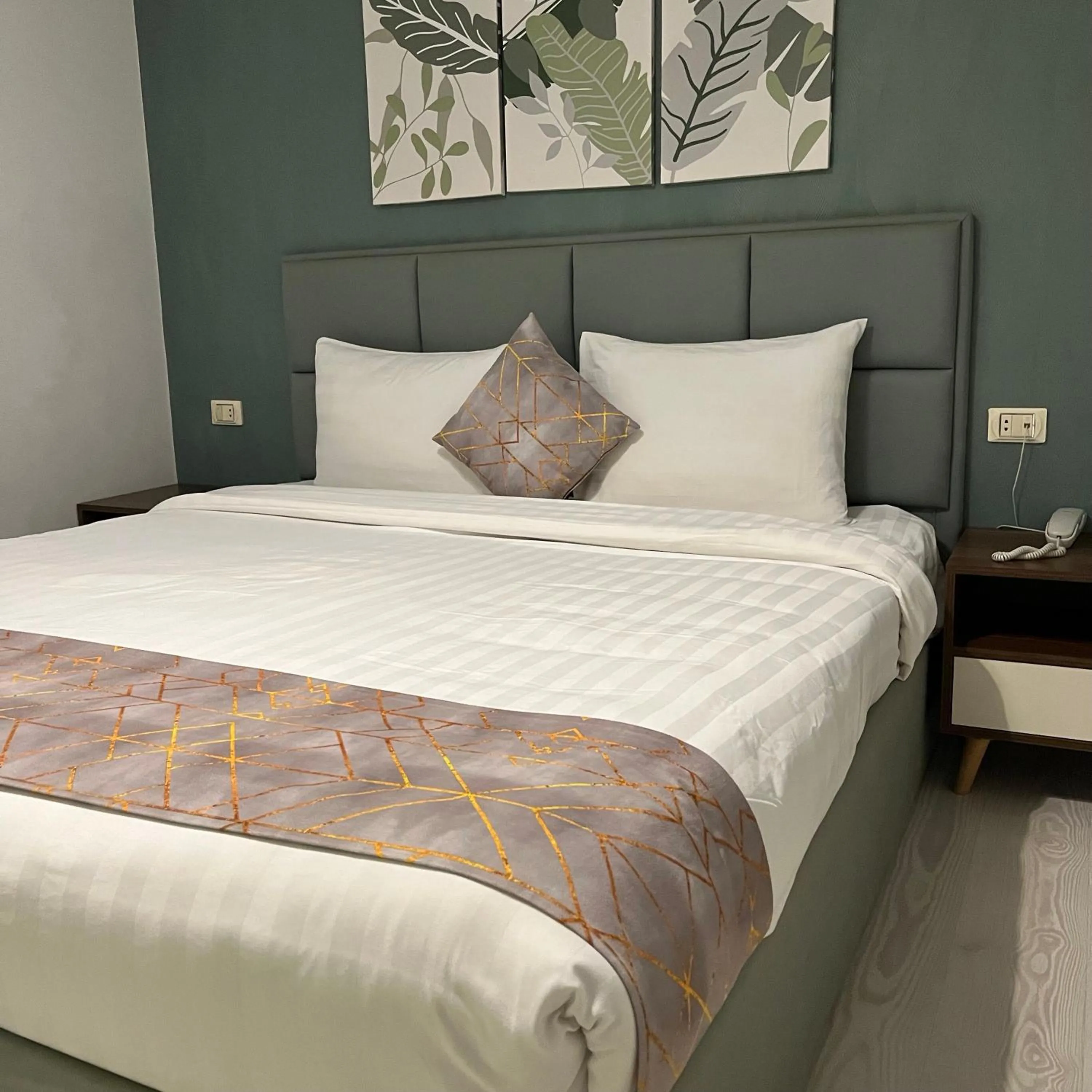 Bed in Jasmine Pyramids Hotel