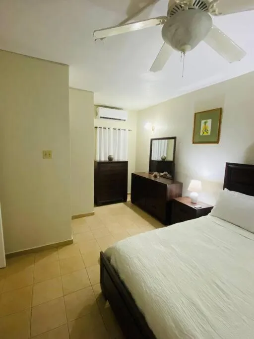 Bedroom, Bed in Club Caribbean Apartments