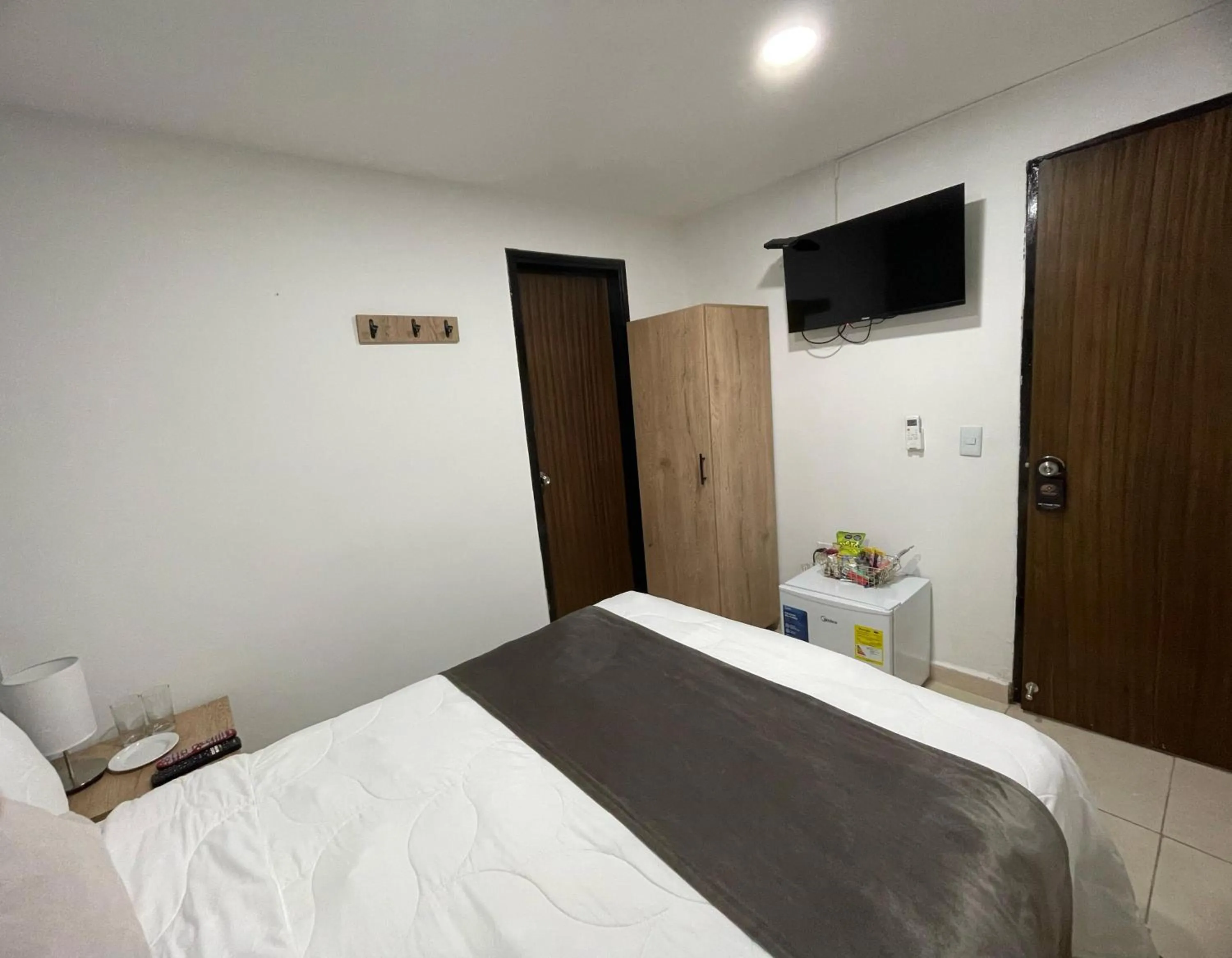 TV and multimedia, Bed in Aguacatala Hotel Boutique