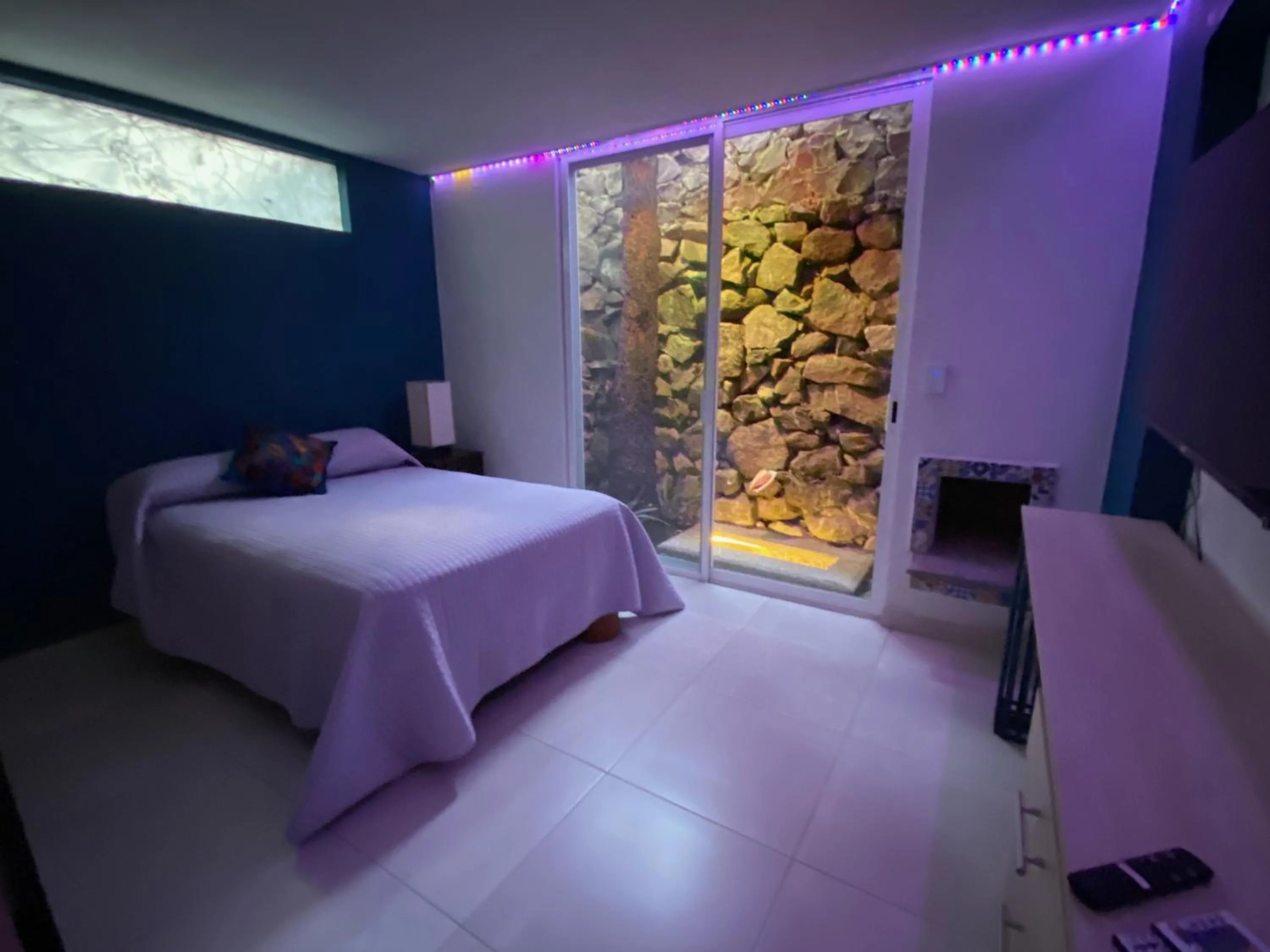 Bed in Magnolias Jardin & Boutique Suites