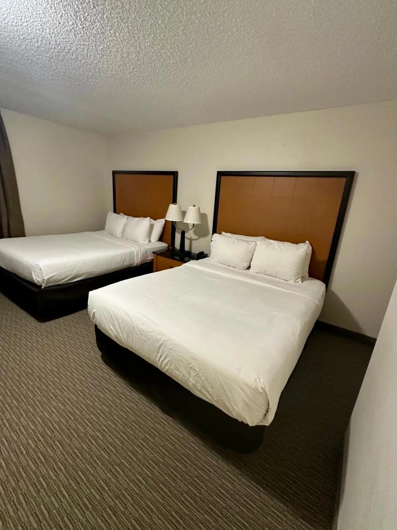 Bed in Anavada Inn & Suites - Grande Prairie