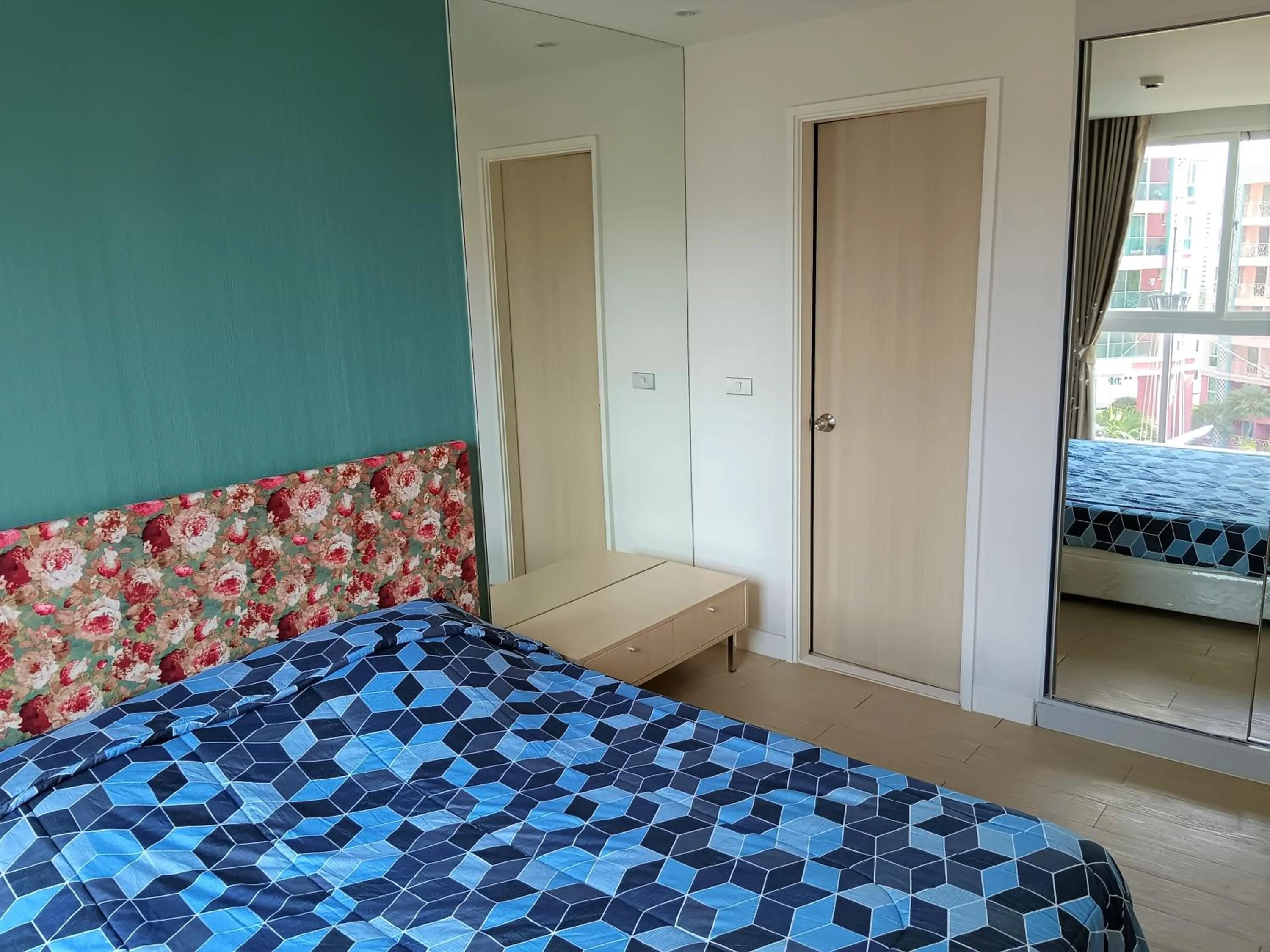 Bed in Grande Caribbean Condo Resort Pattaya