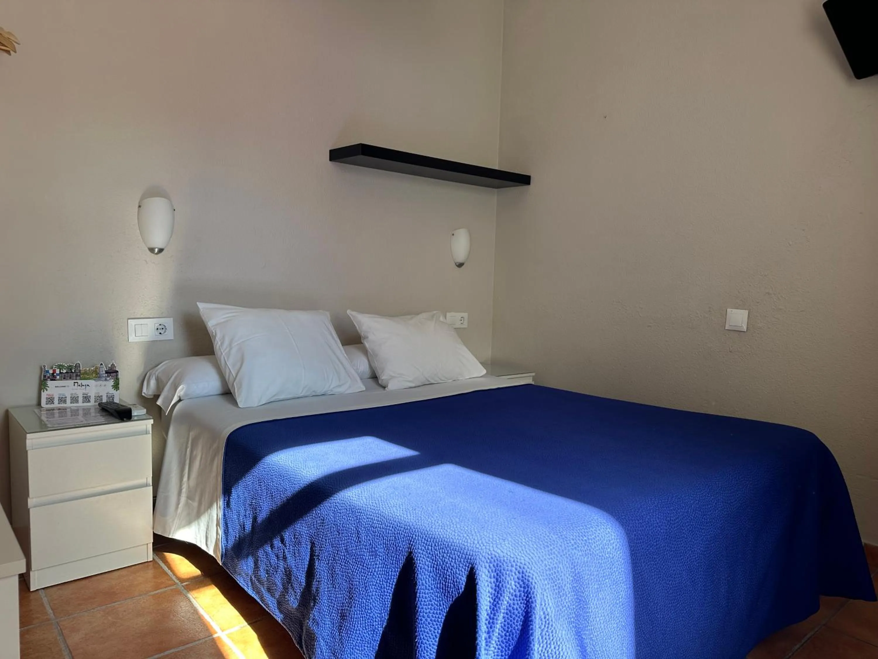 Photo of the whole room, Bed in Hostal Moscatel