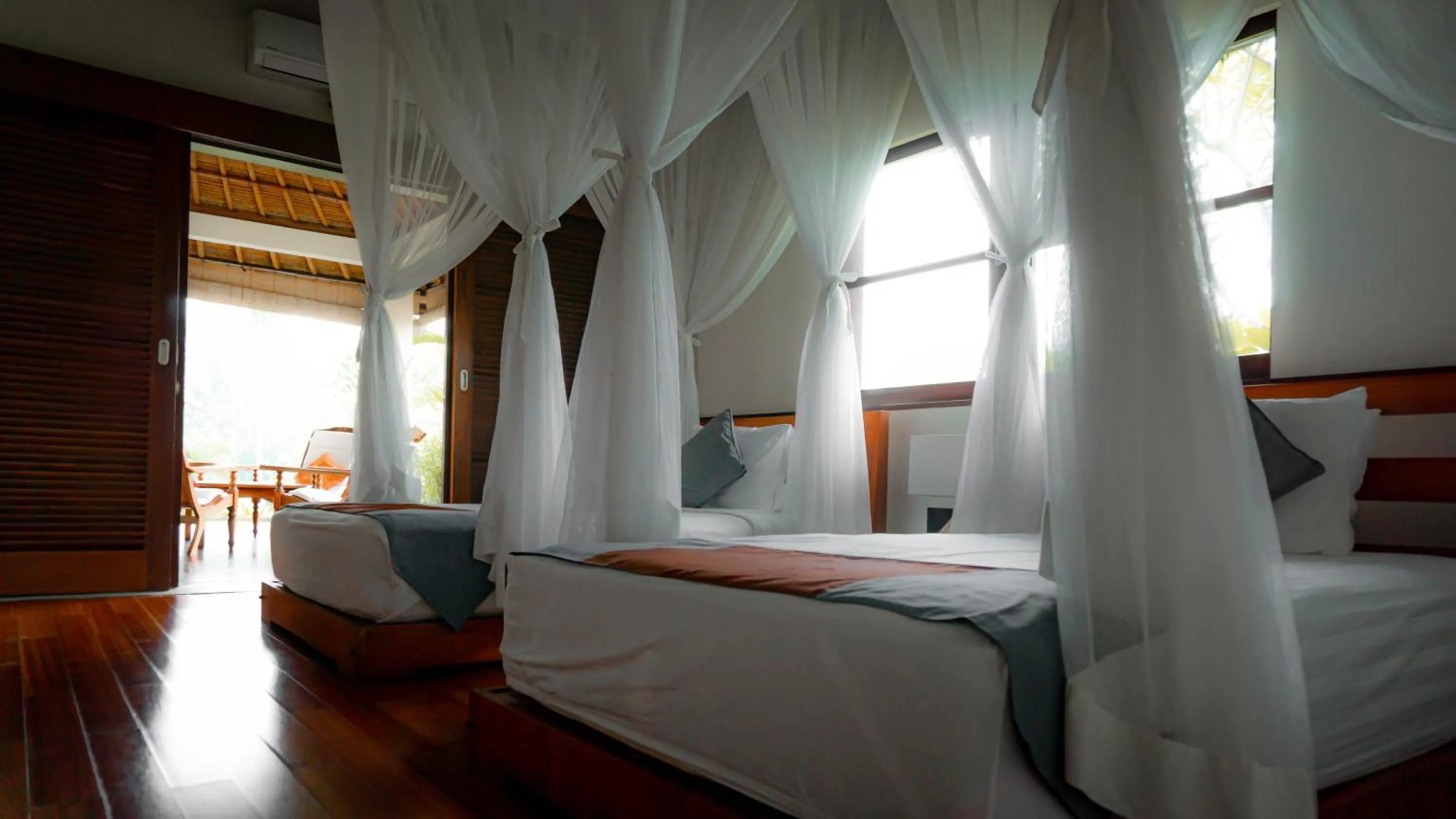 Bed in The Lotus Residence by Amerta Experience