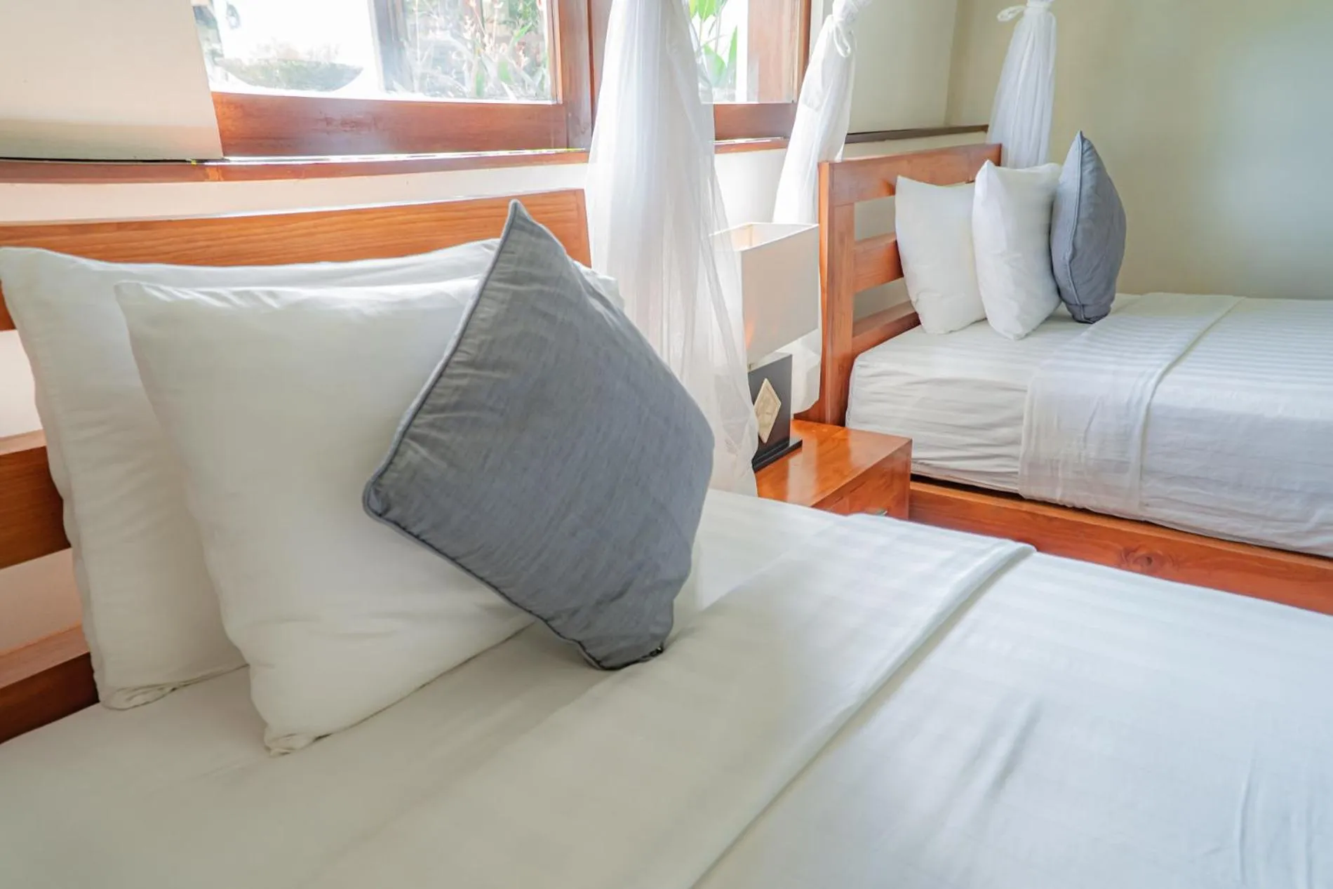 Bed in The Lotus Residence by Amerta Experience