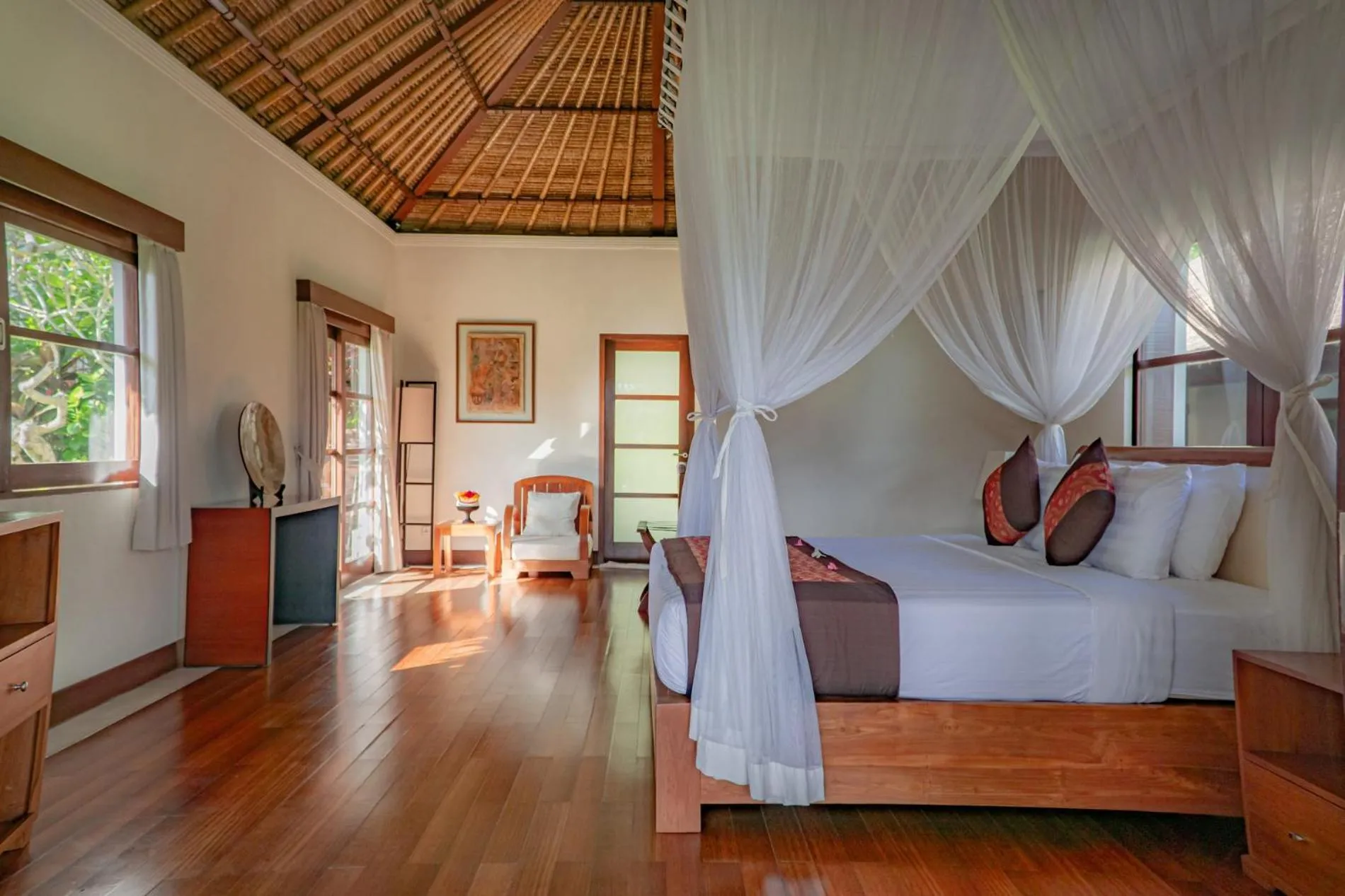 Photo of the whole room, Bed in The Lotus Residence by Amerta Experience