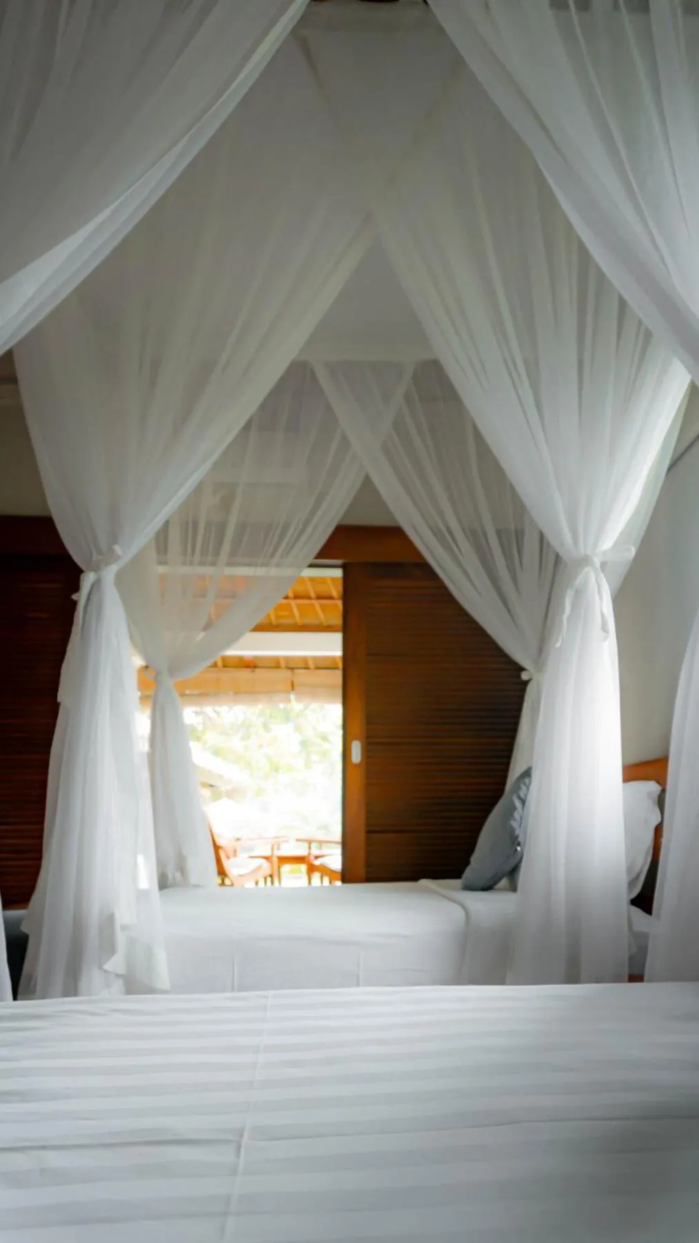 Bed in The Lotus Residence by Amerta Experience