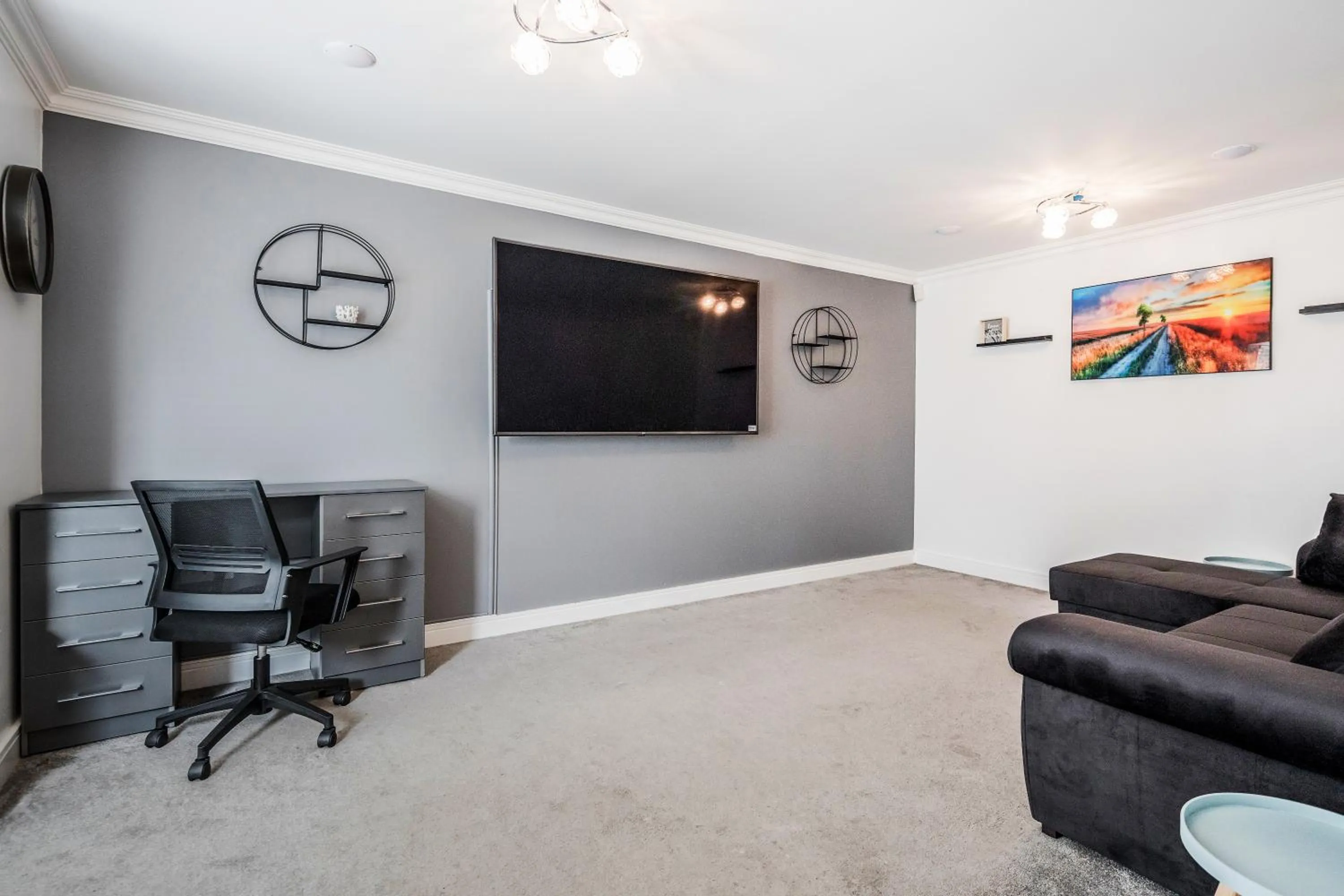 TV and multimedia in Spacious Stay I 5 BDR House with Modern Amenities I Parking I WiFi
