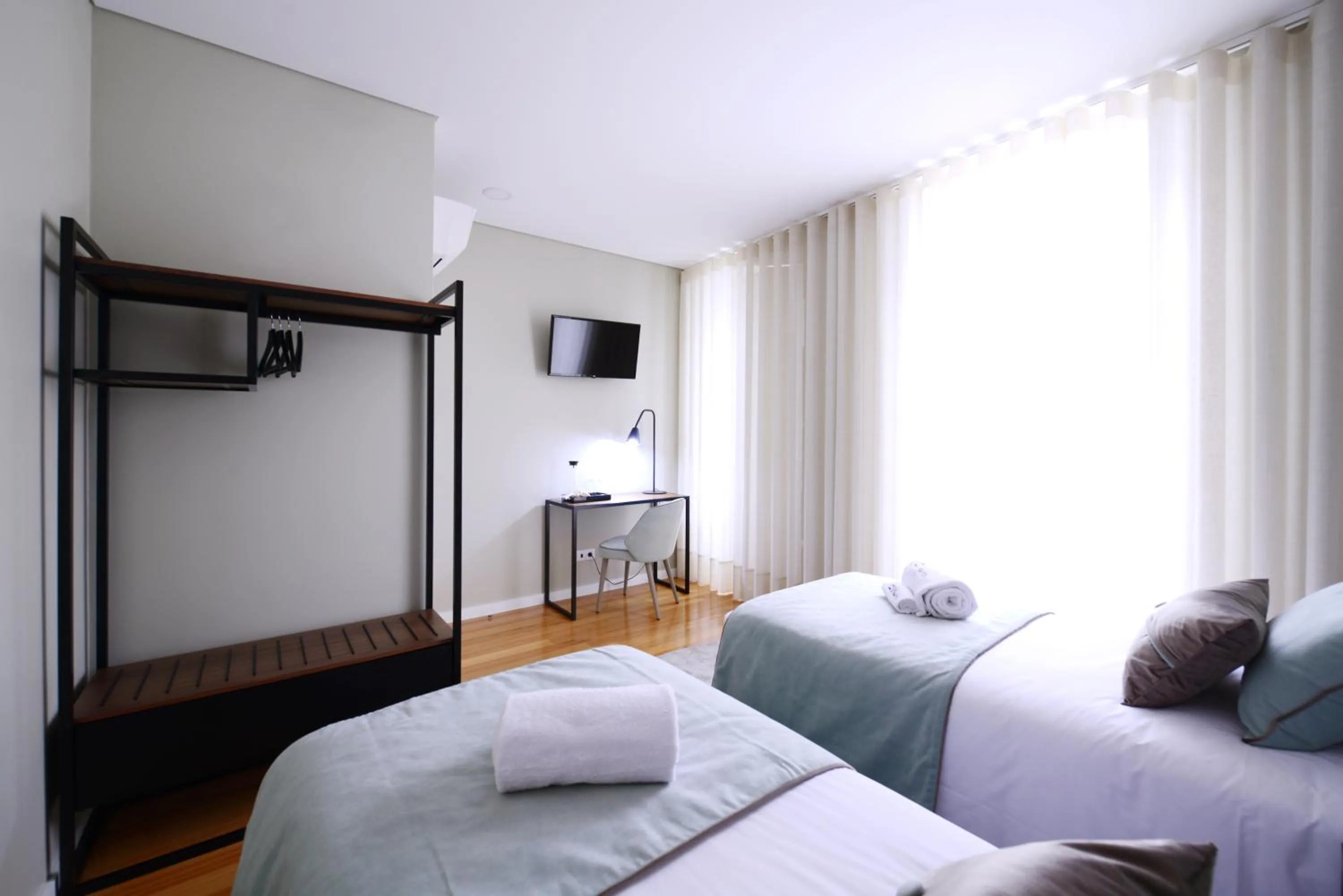 Bed in VILA DE PONTE GUEST HOUSE