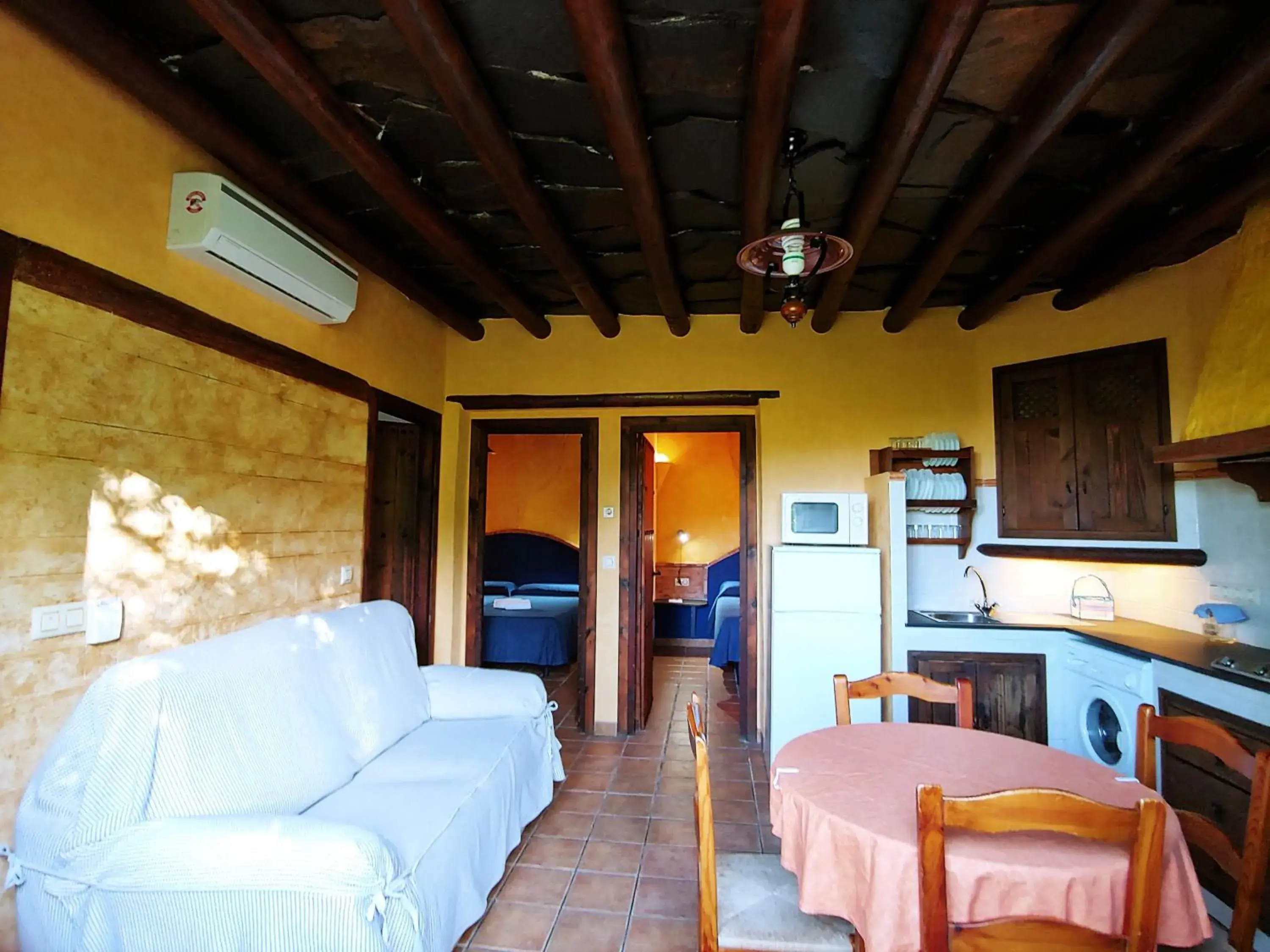 Living room, Bed in Turismo Rural & SPA El Cercado Living room, Bed in Turismo Rural & SPA El Cercado