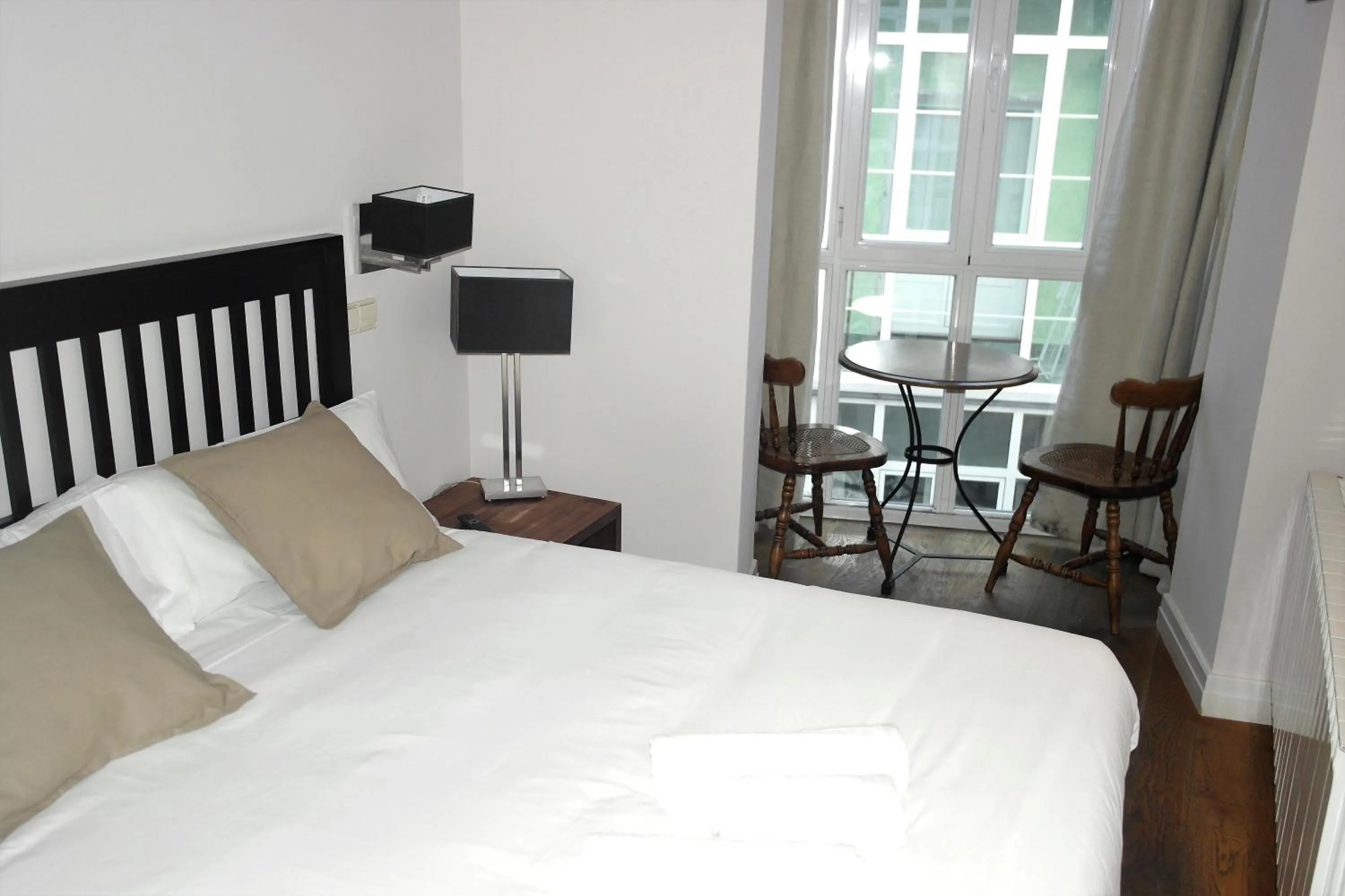 Balcony/Terrace, Bed in Hotel Cuéntame La Puebla