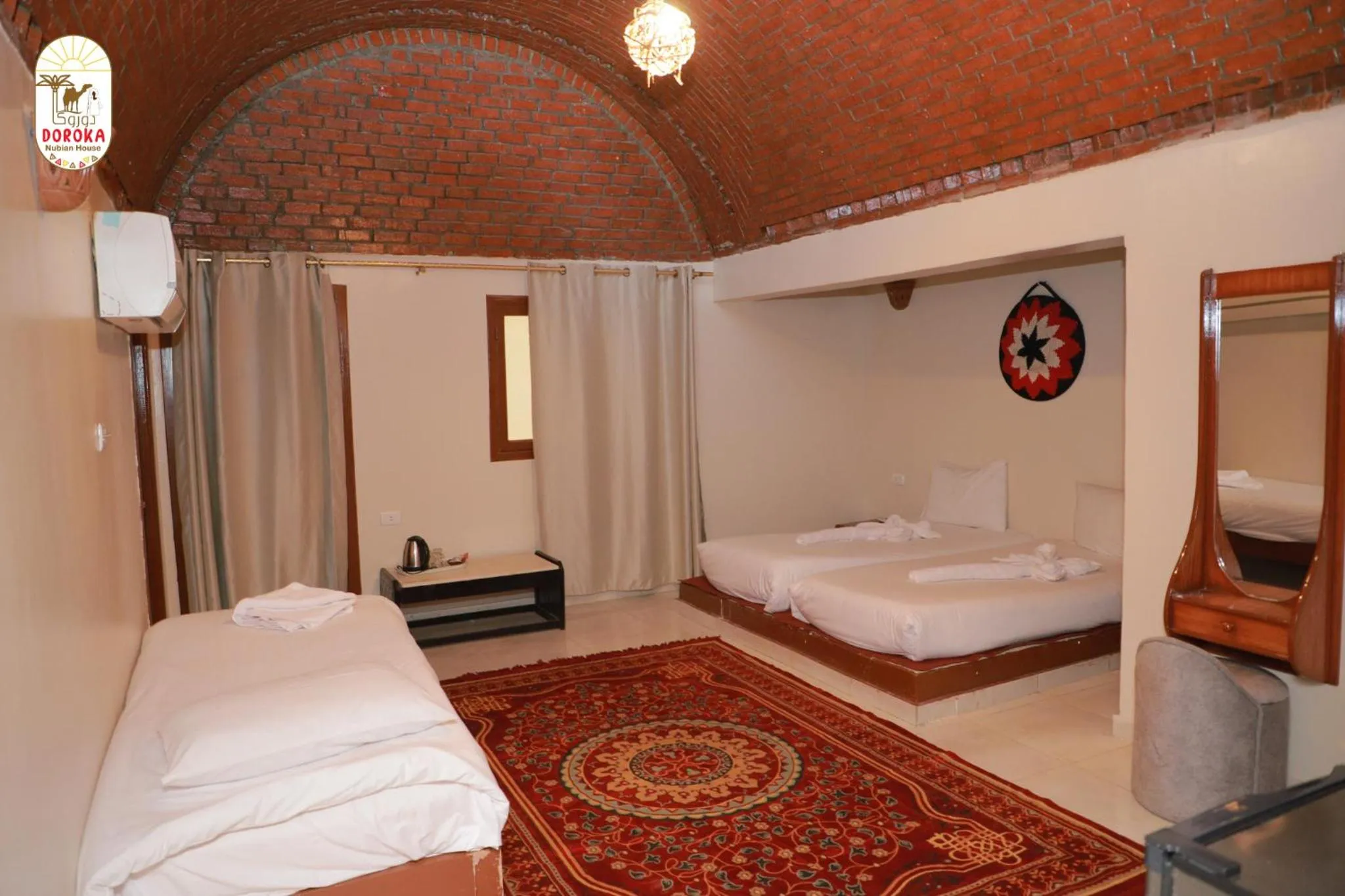 Photo of the whole room, Bed in DoroKa Nubian House