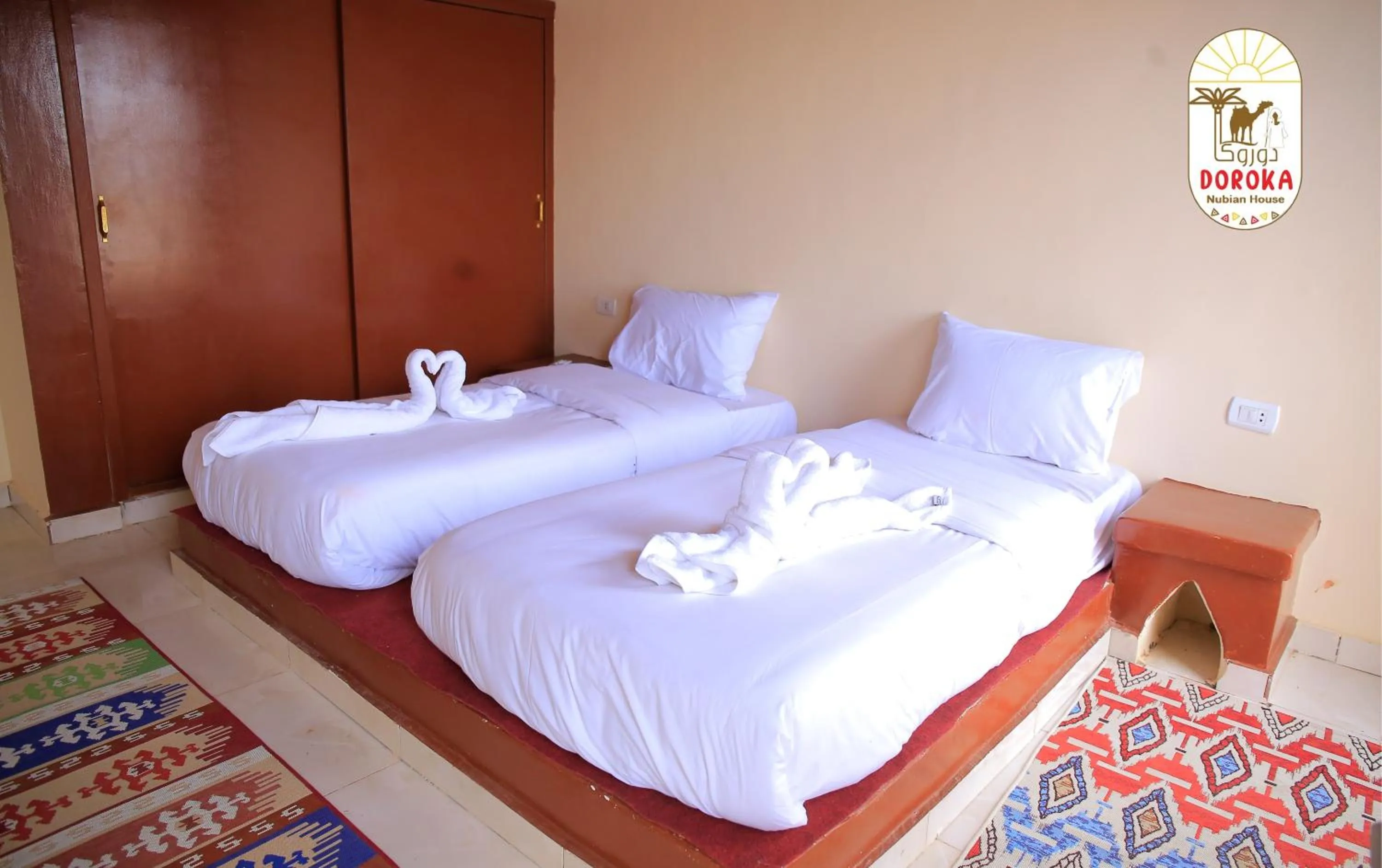 Photo of the whole room, Bed in DoroKa Nubian House