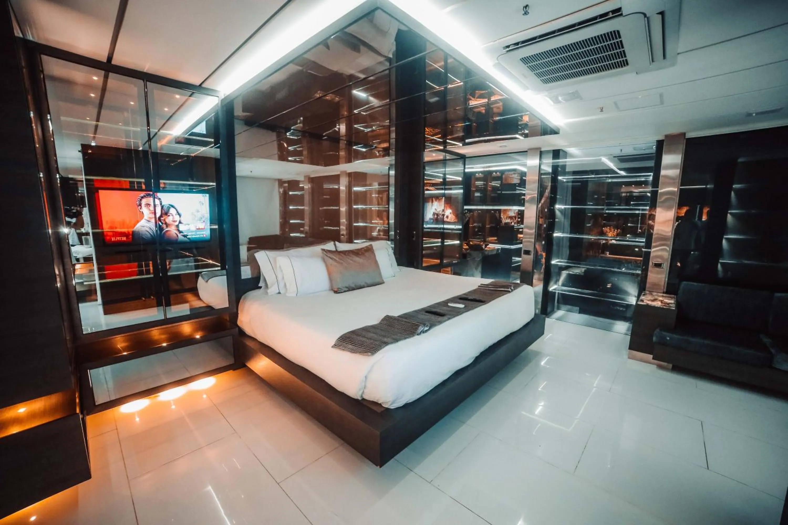 Bedroom in 1Million Luxury Suites
