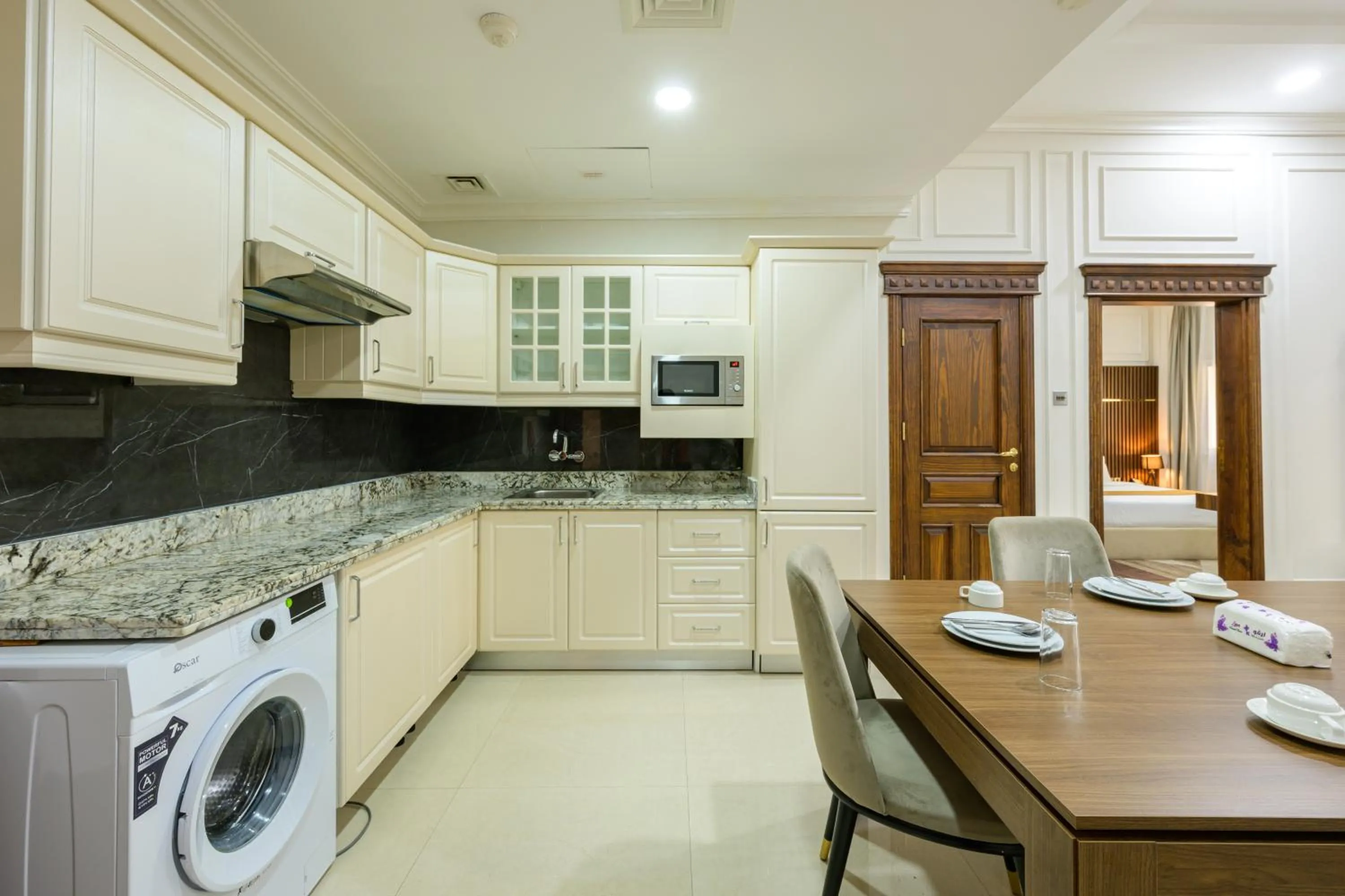 Kitchen or kitchenette in Abraj Royal Hotel