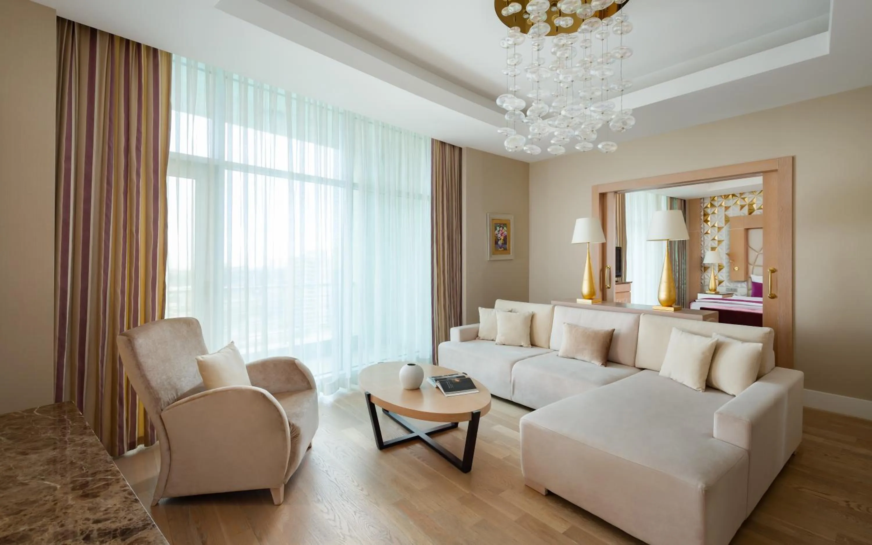 Living room, Bed in Badamdar Hotel and Residences