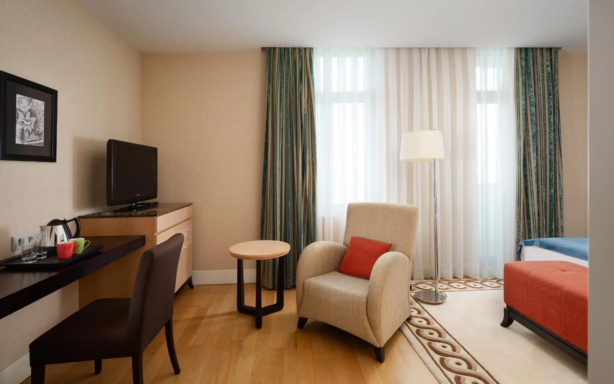 Seating area, Bed in Badamdar Hotel and Residences