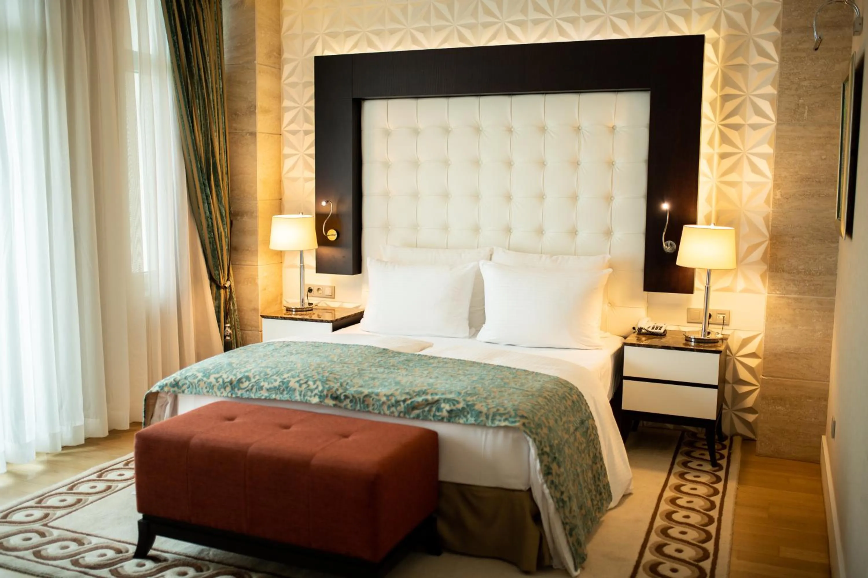 Bed in Badamdar Hotel and Residences