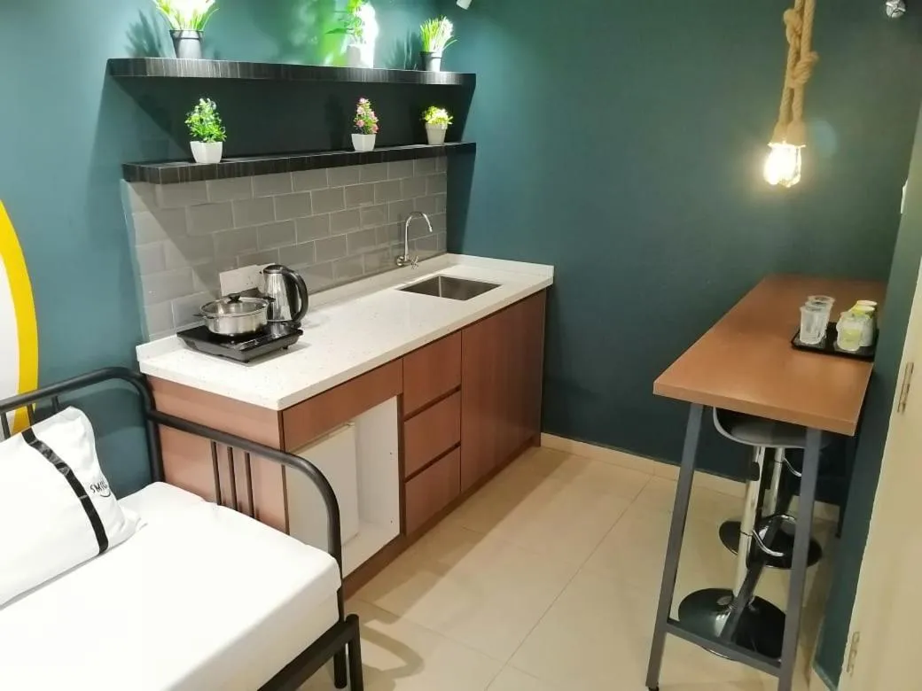 Kitchen or kitchenette in Smile Hotel Cheras Taman Segar