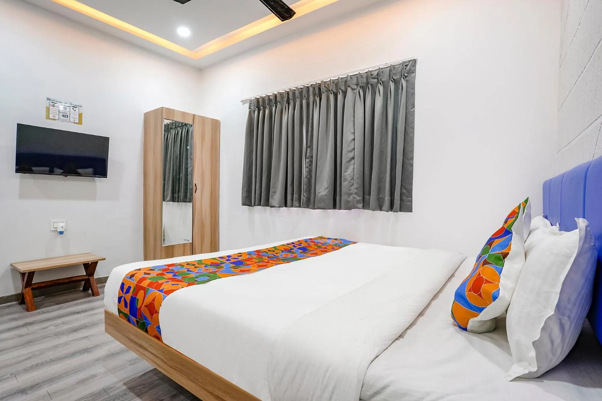 Communal lounge/ TV room, Bed in FabHotel Vrundavan, Athwa