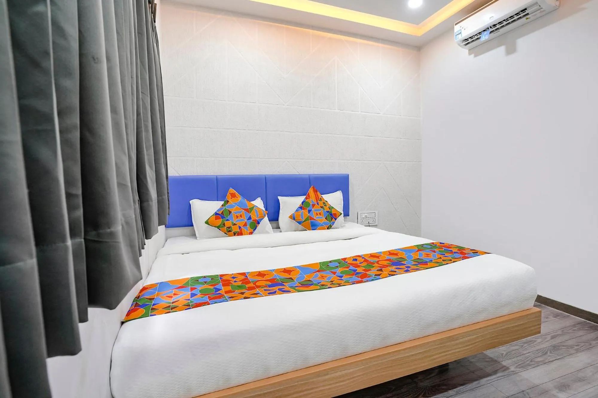 Living room, Bed in FabHotel Vrundavan, Athwa