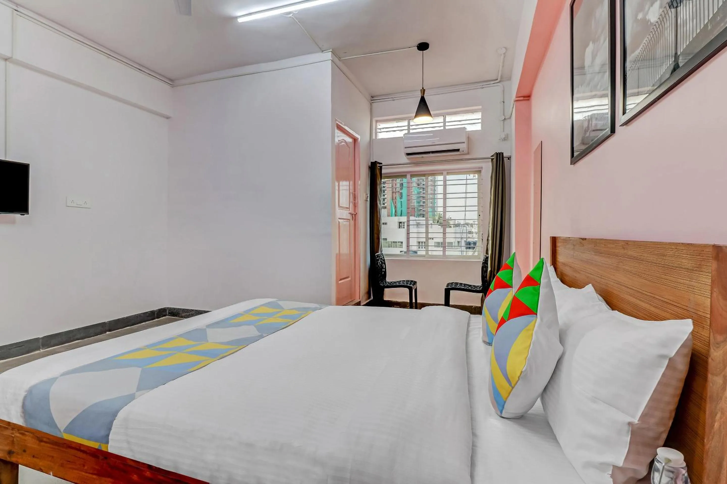 Bedroom, Bed in Capital O Elite Stay Jp Nagar Near SRI SATHYA GANAPATHI SHIRDI SAIBABA Temple