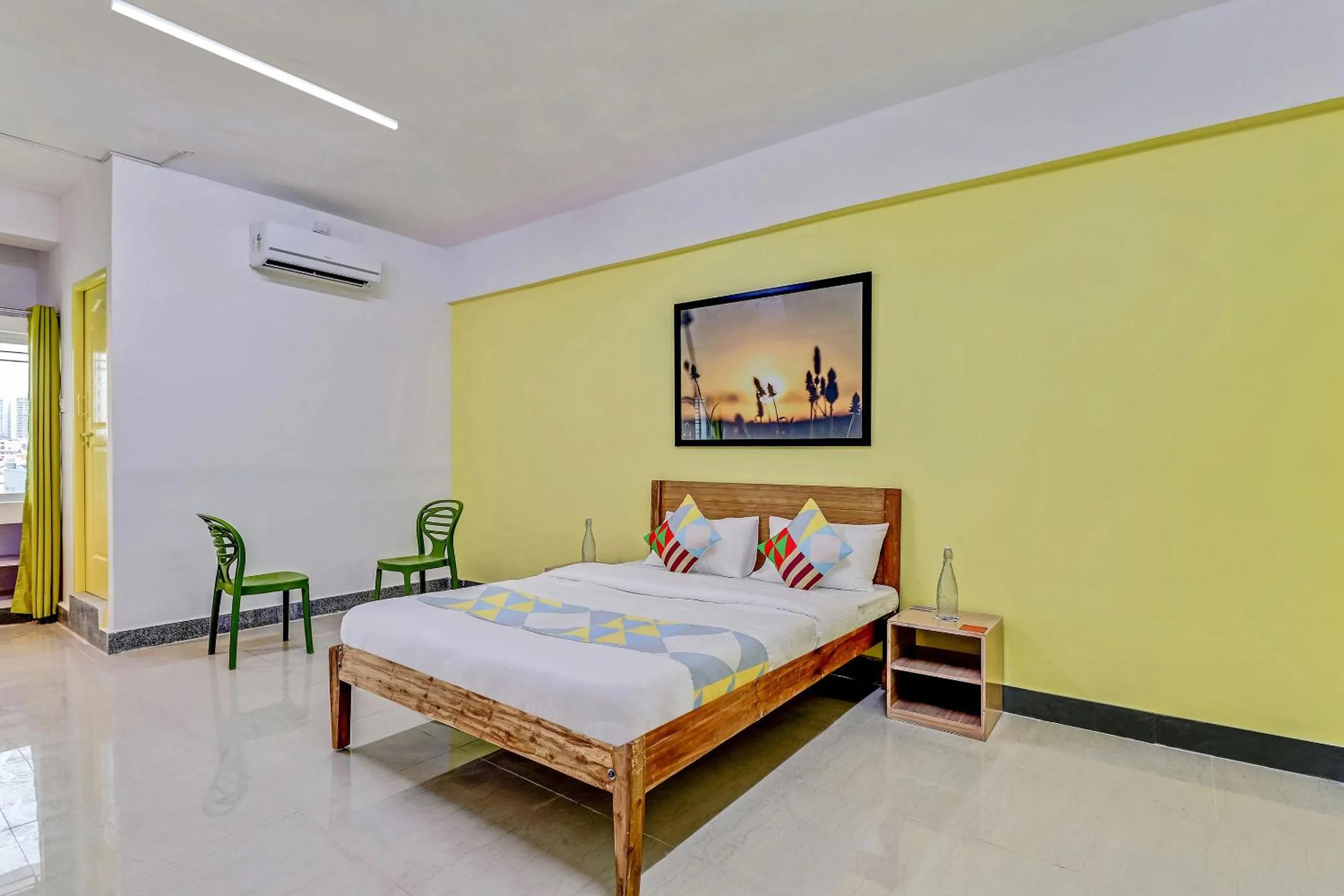 Bedroom, Bed in Capital O Elite Stay Jp Nagar Near SRI SATHYA GANAPATHI SHIRDI SAIBABA Temple