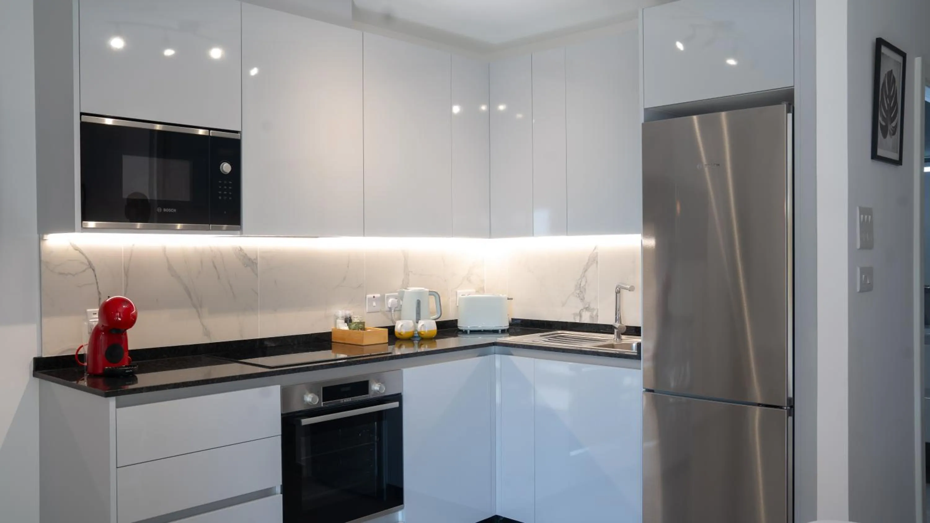 Kitchen or kitchenette in E1 Suites & Spa aparthotel style - Gym & Spa