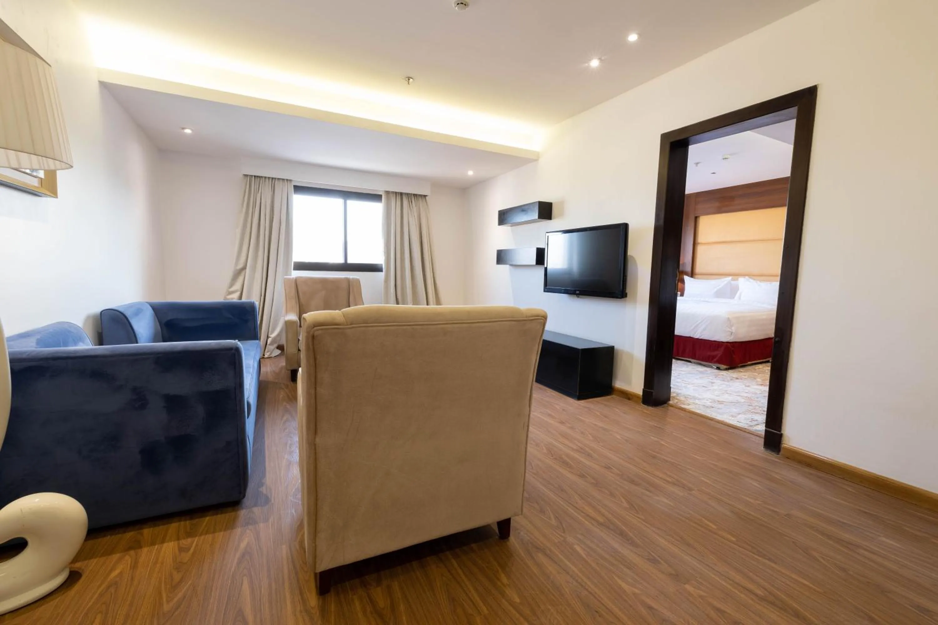 Living room, Bed in Mira Business Hotel