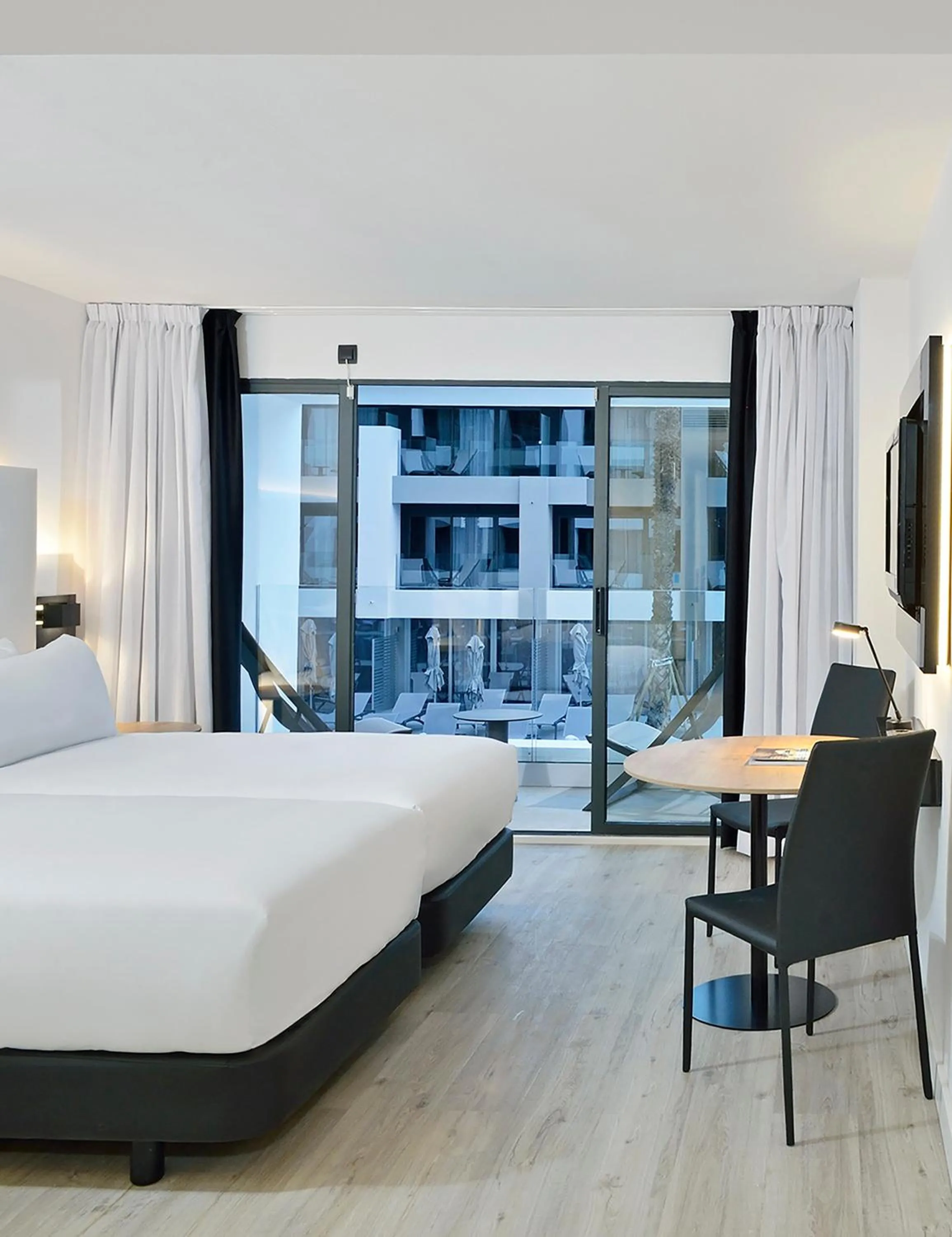 Bed in INNSiDE by Meliá Palma Bosque