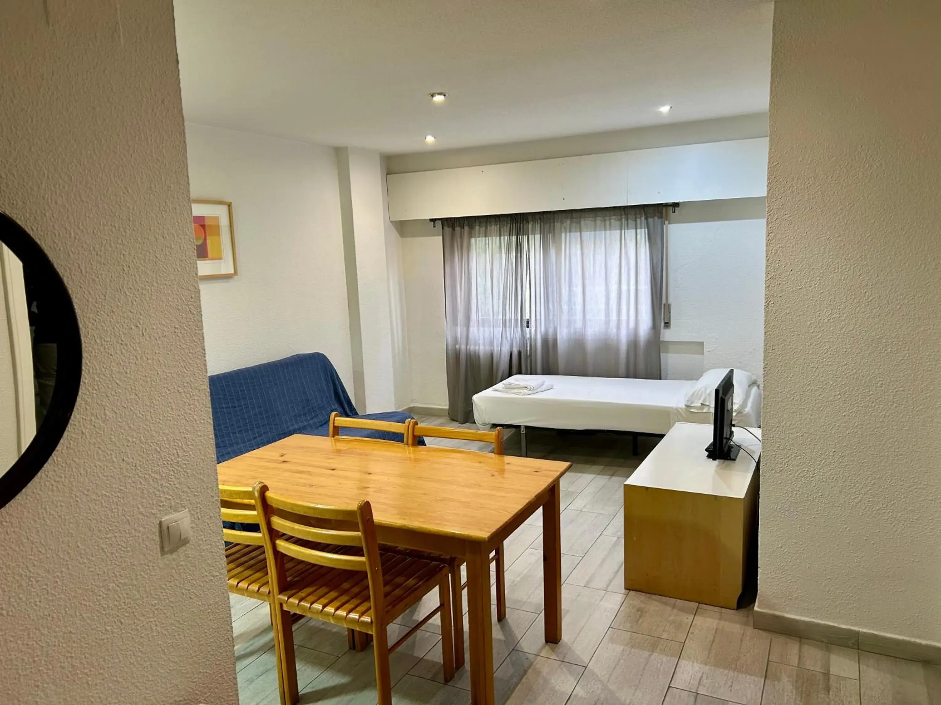 Living room, Bed in Apartamentos Goya 75 Living room, Bed in Apartamentos Goya 75