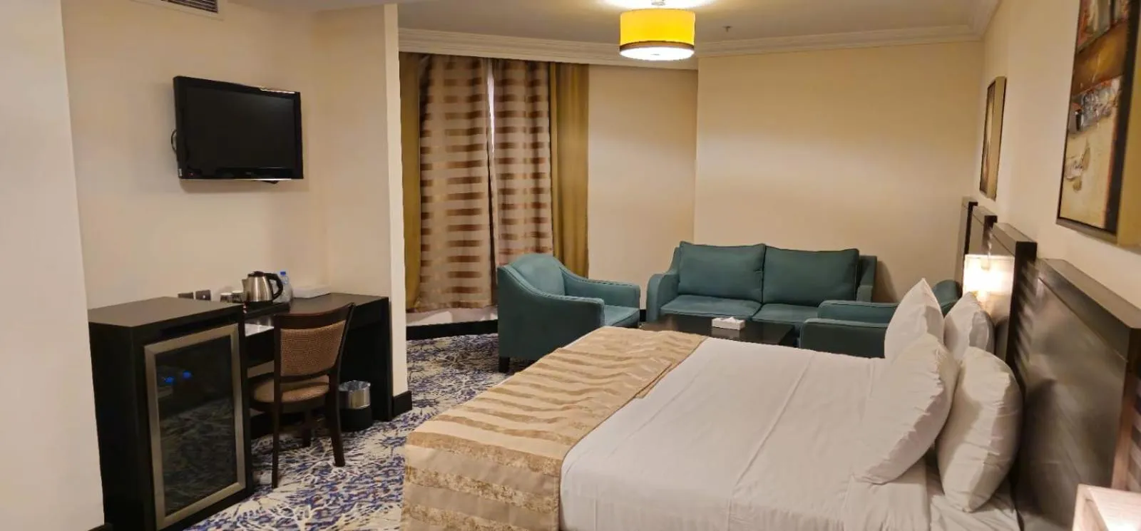 Seating area, Bed in Al Hidayah Towers Hotel